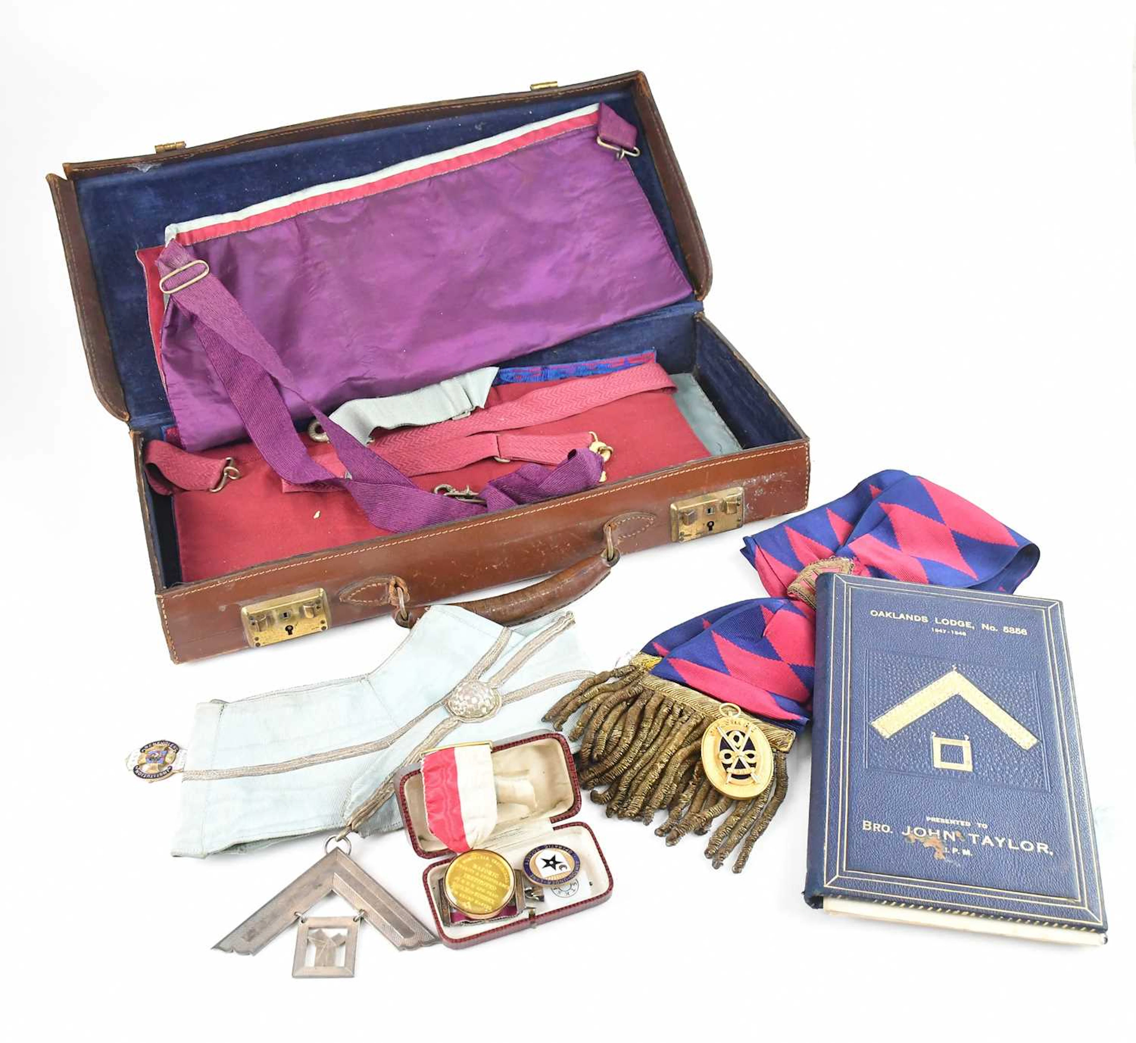 A collection of Masonic regalia comprising cuffs