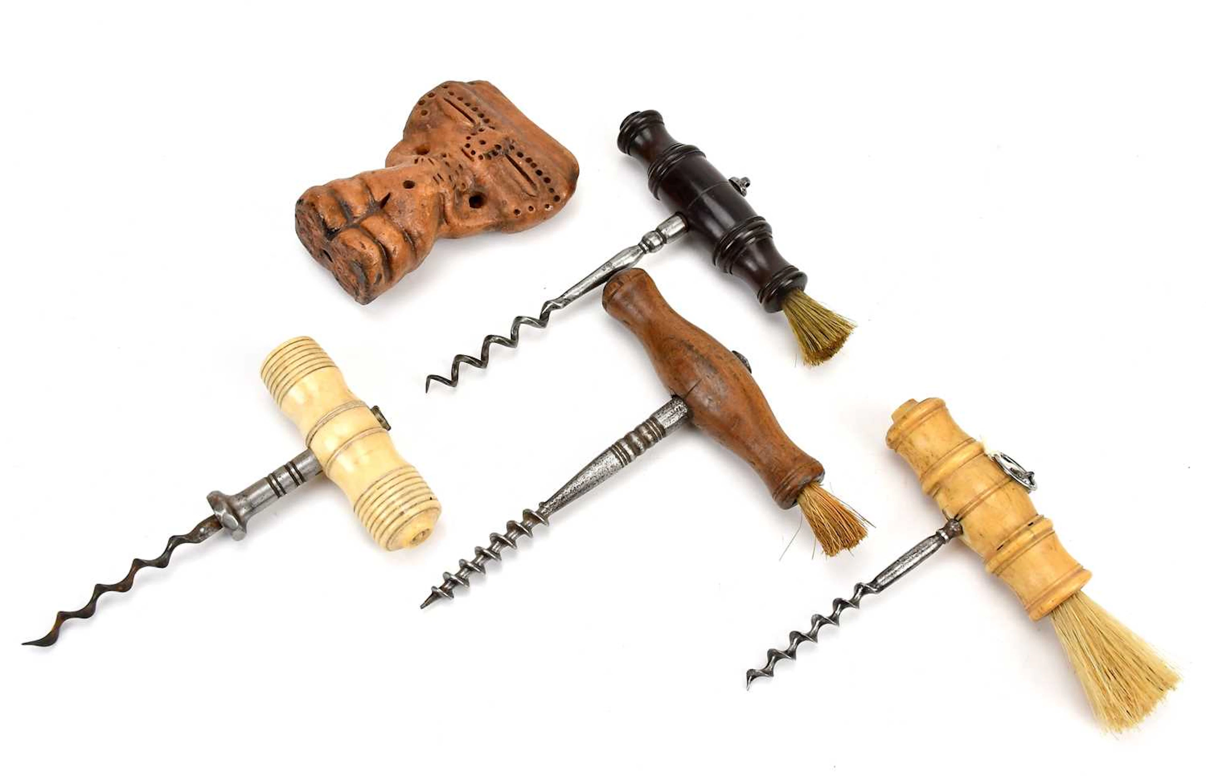 Four 19th century corkscrews including two bone top examples