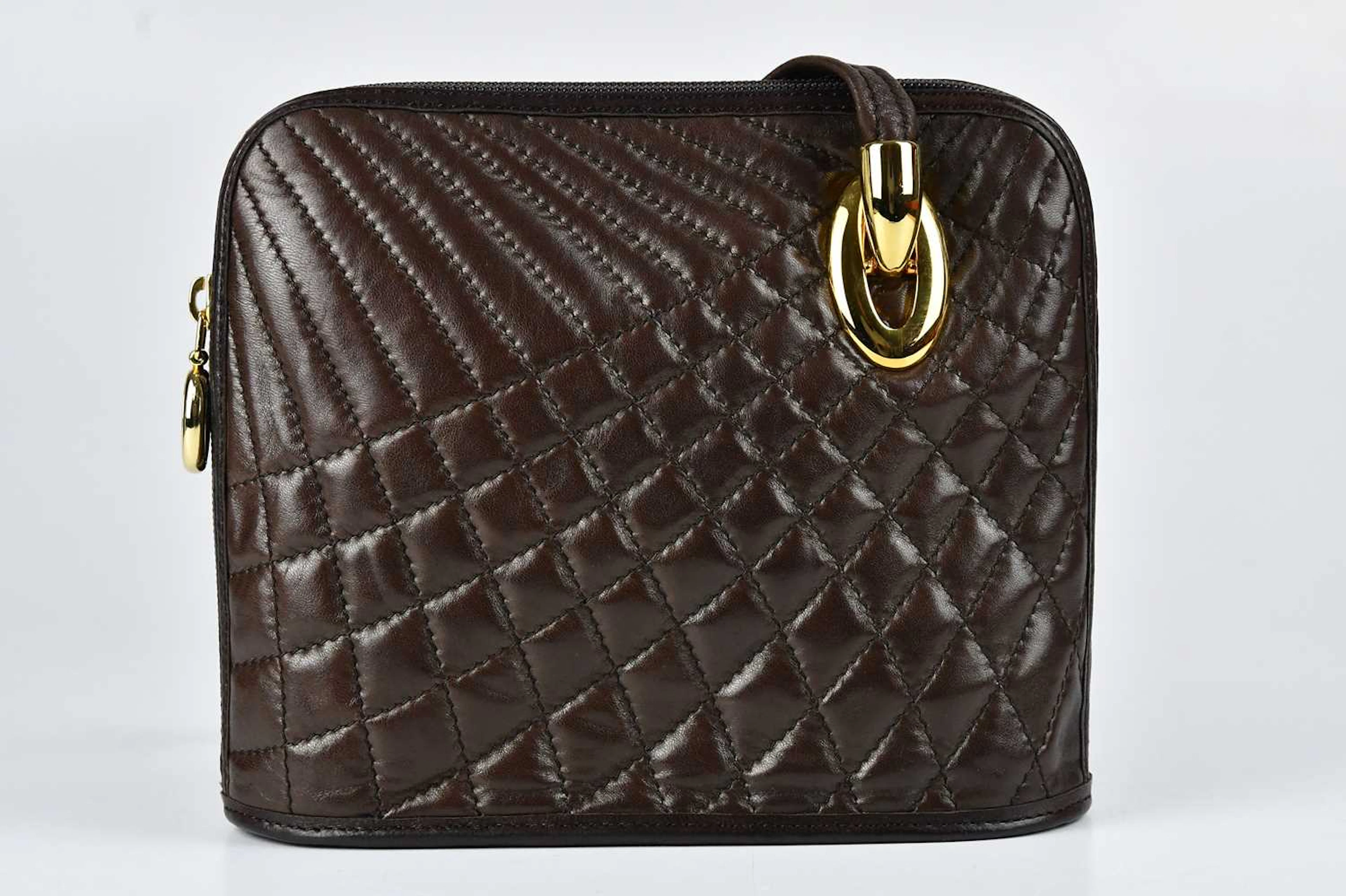 JEAN MICHEL NOUVEAU; a vintage brown calfskin leather...