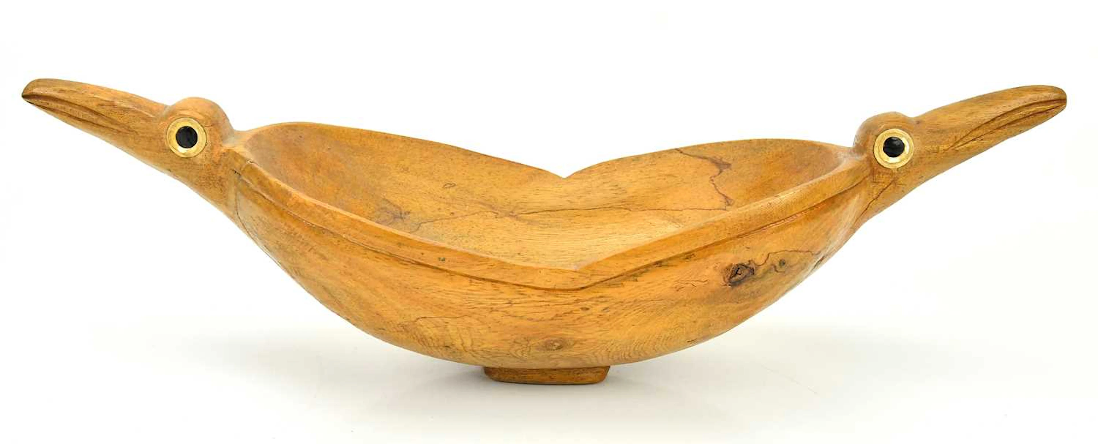 A wooden twin handled fruit bowl