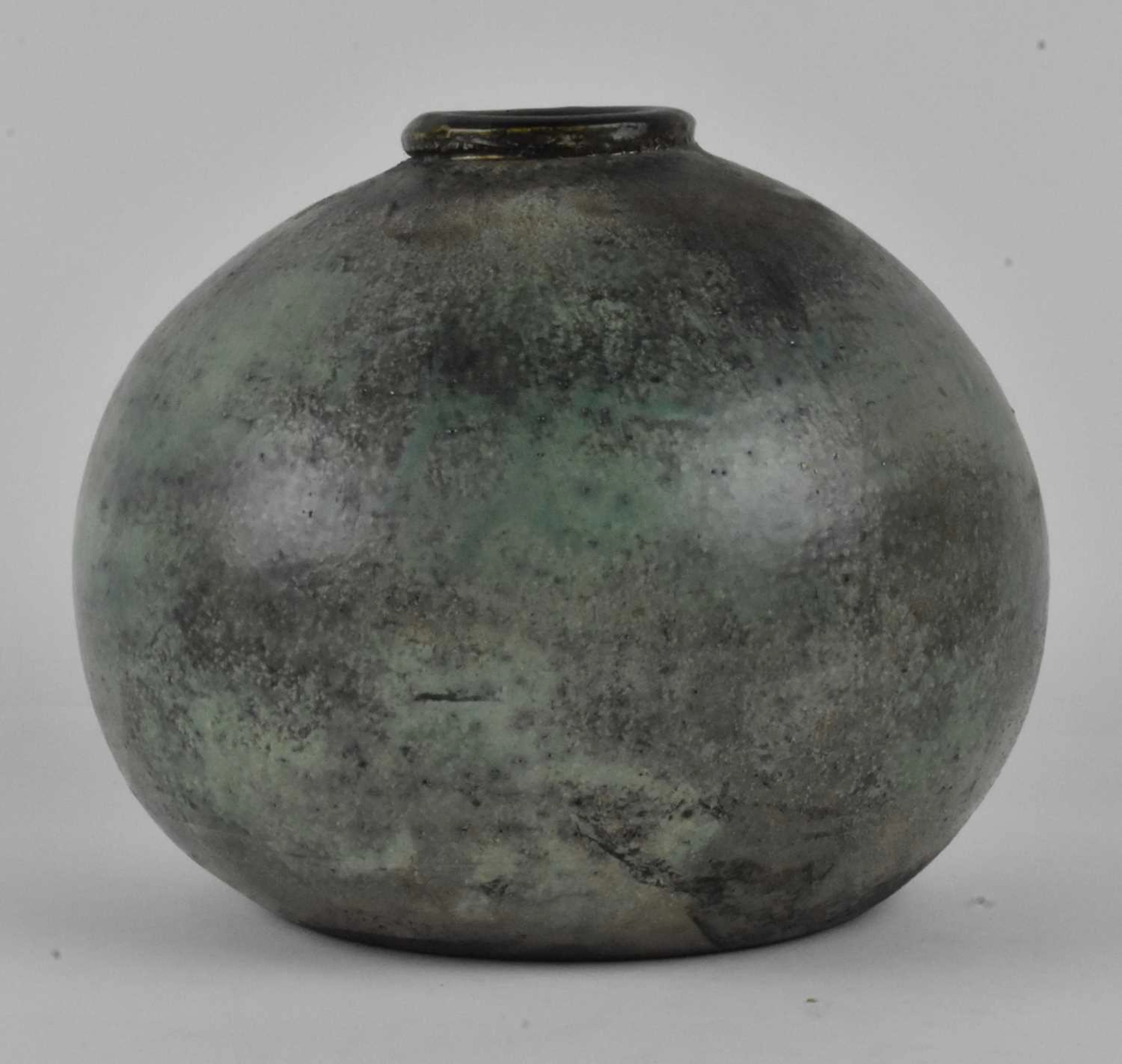 A stoneware bulbous form squat vase