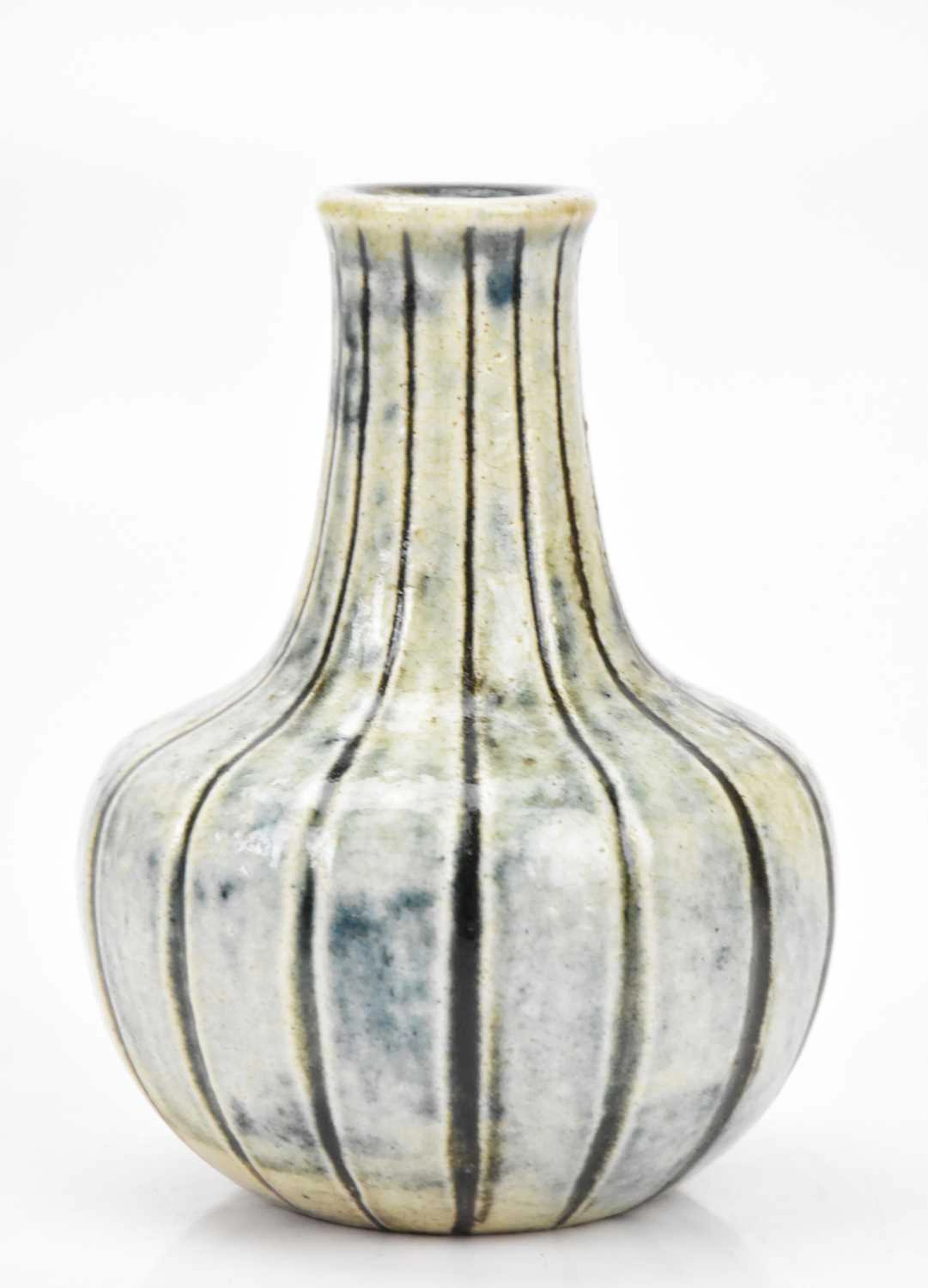 ROBERT WALLACE MARTIN; a Martin Brothers vase of bulbous form