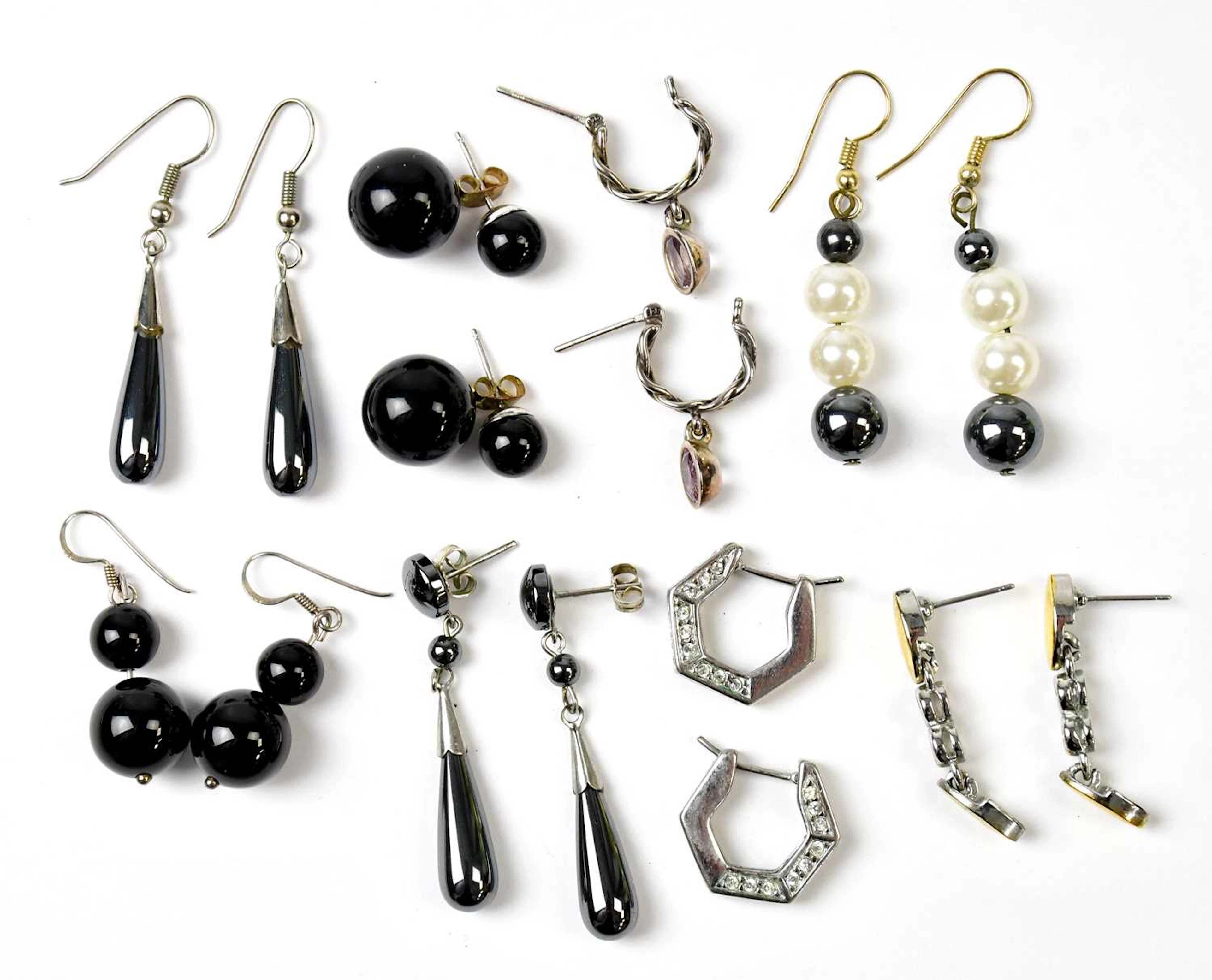 Eight pairs of earrings