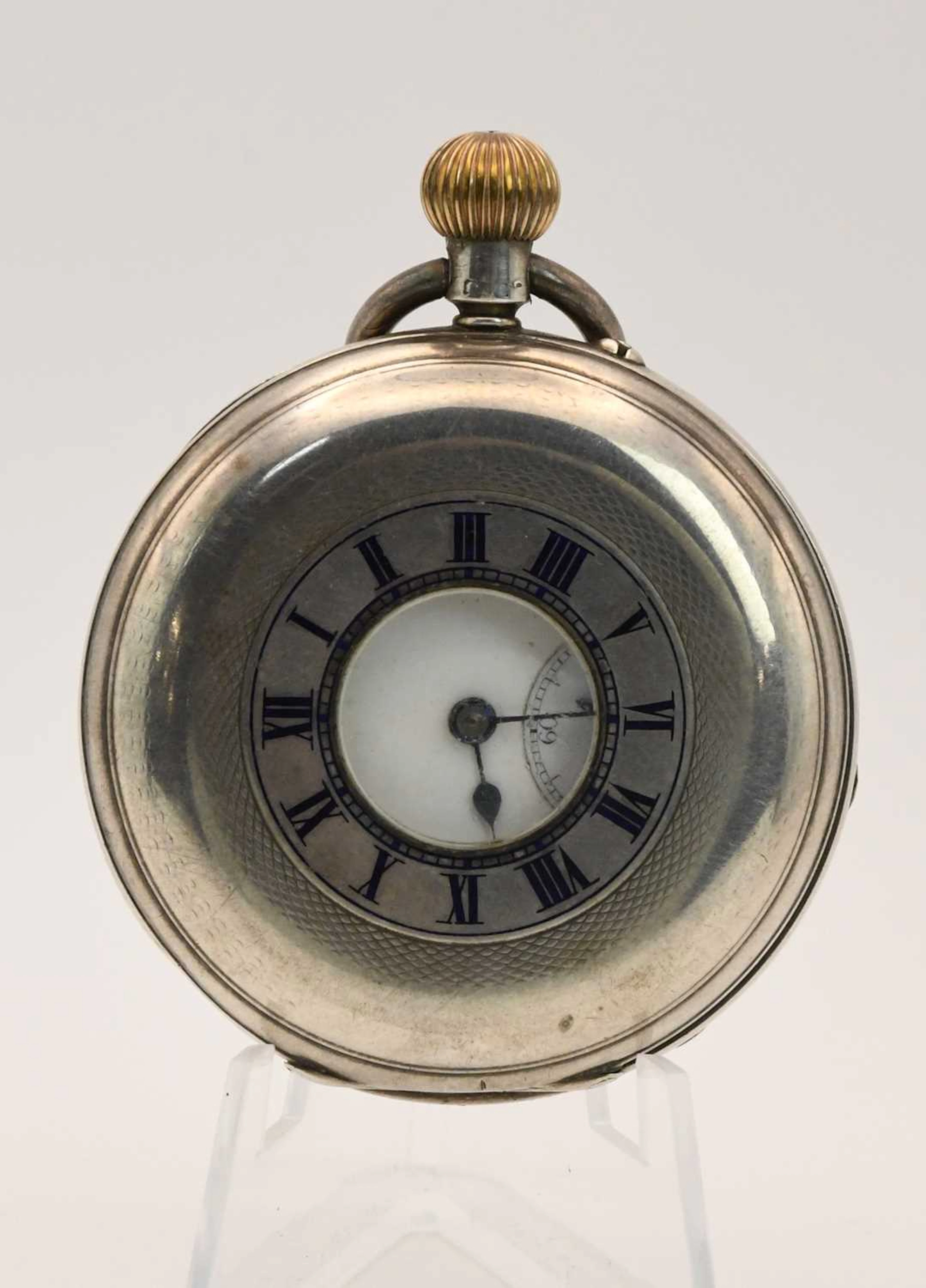 An early 20th century hallmarked silver cased half hunter pocket watch