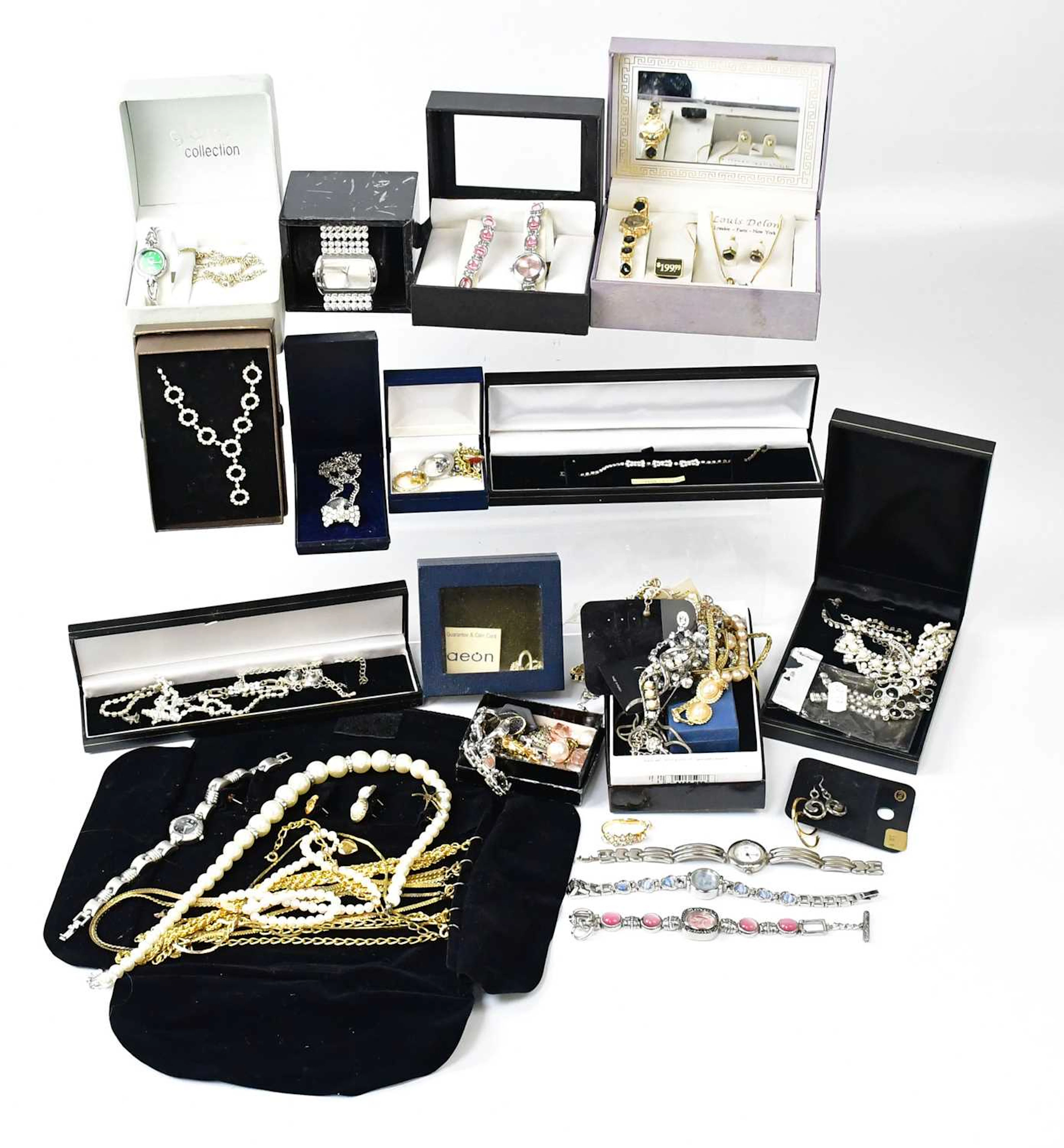 A quantity of costume jewellery and dress watches