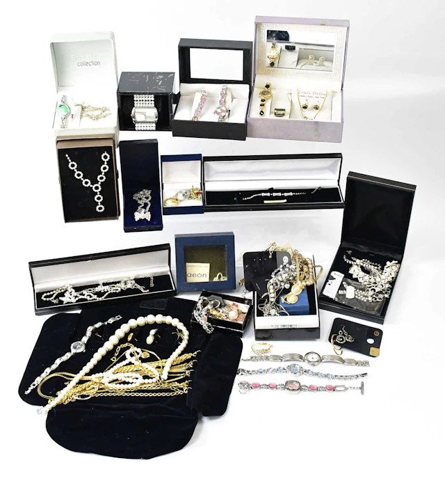 A quantity of costume jewellery and dress watches