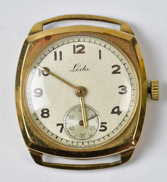 LEDA; a 9ct yellow gold watch head