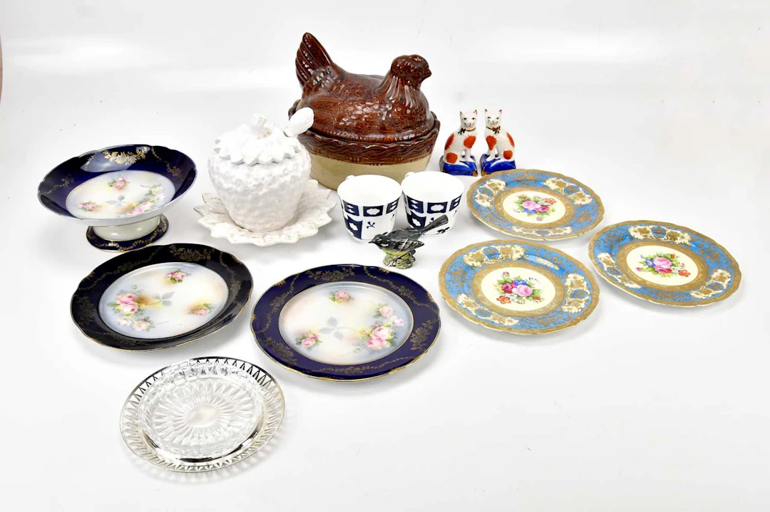 A collection of mixed ceramics including a hen on nest lidded dish