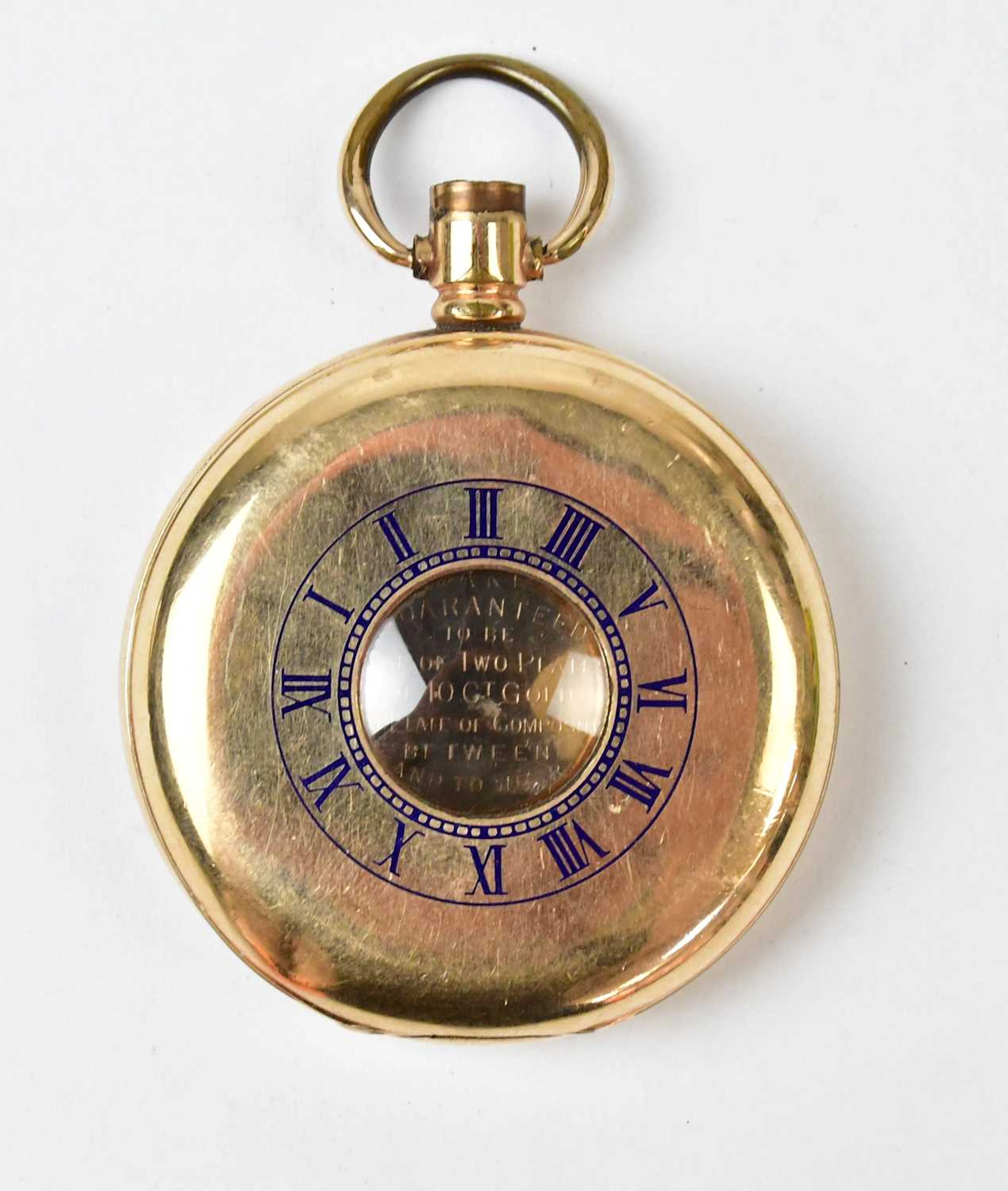A gold-plated half hunter pocket watch case with blue enamelled Roman numerals