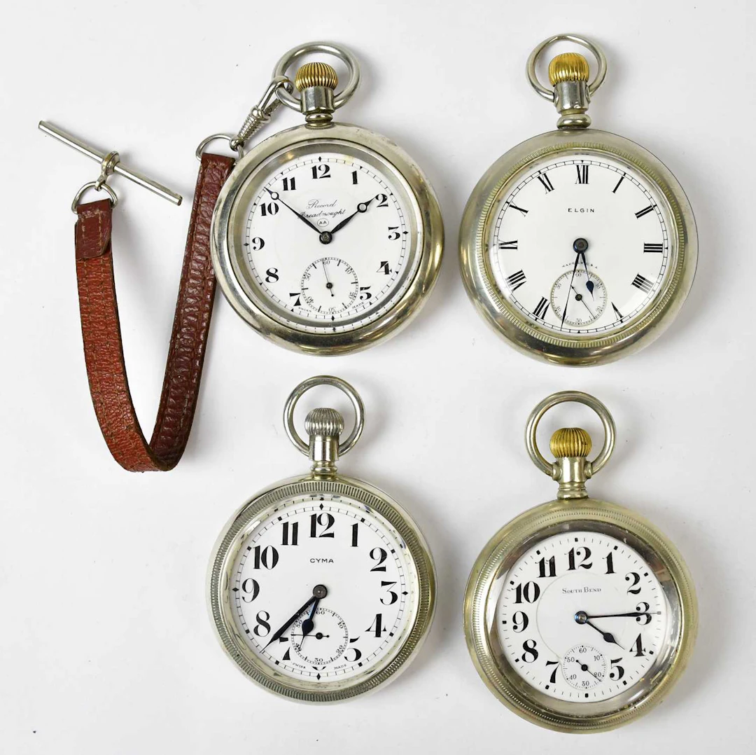 Four silver-plated open face crown wind pocket watches