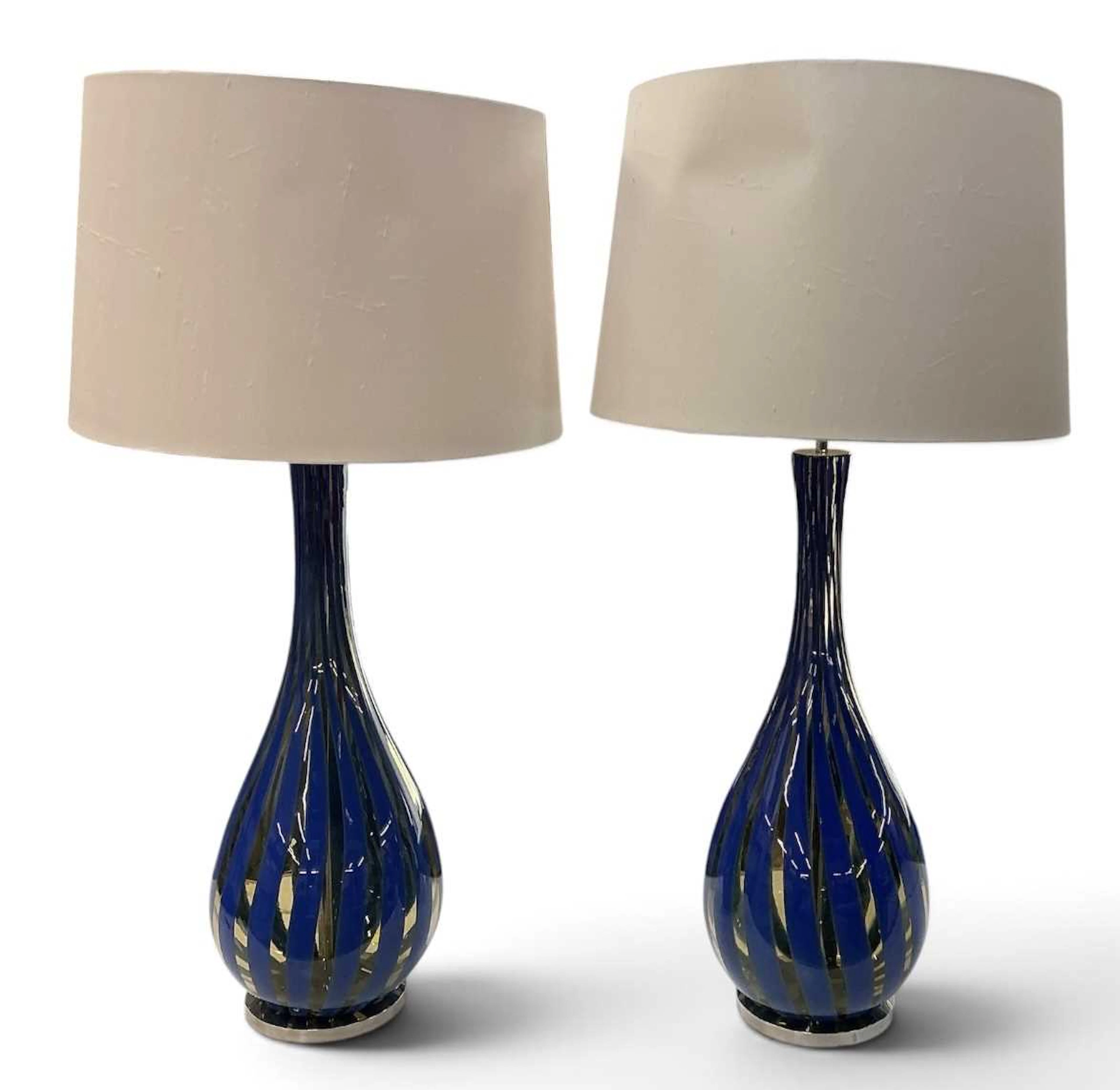 IN THE MANNER OF MURANO; a pair of modern contemporary...