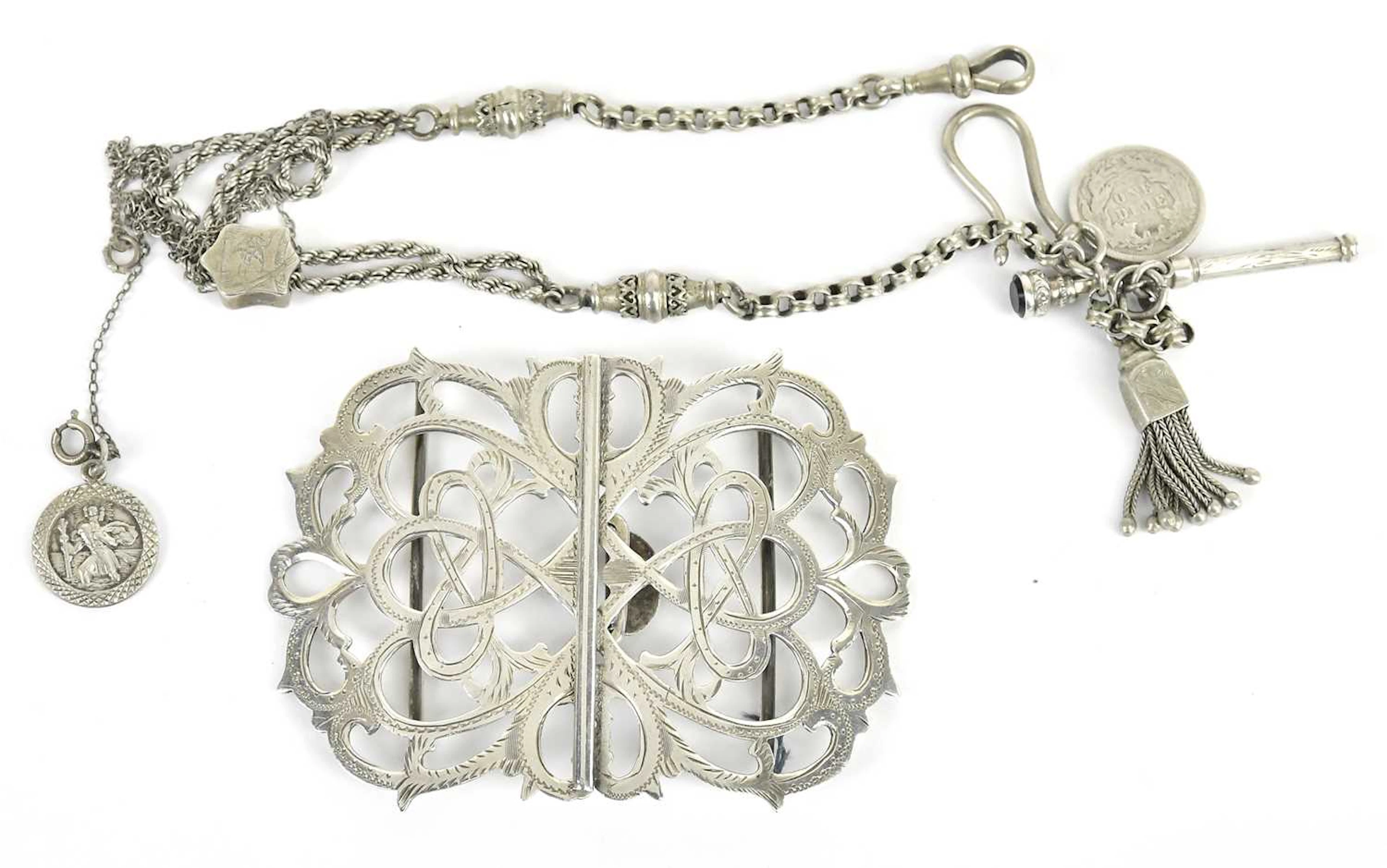 G E WALTON & CO; an Edward VII hallmarked silver nurse's belt buckle