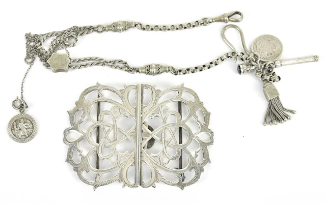 G E WALTON & CO; an Edward VII hallmarked silver nurse's belt buckle