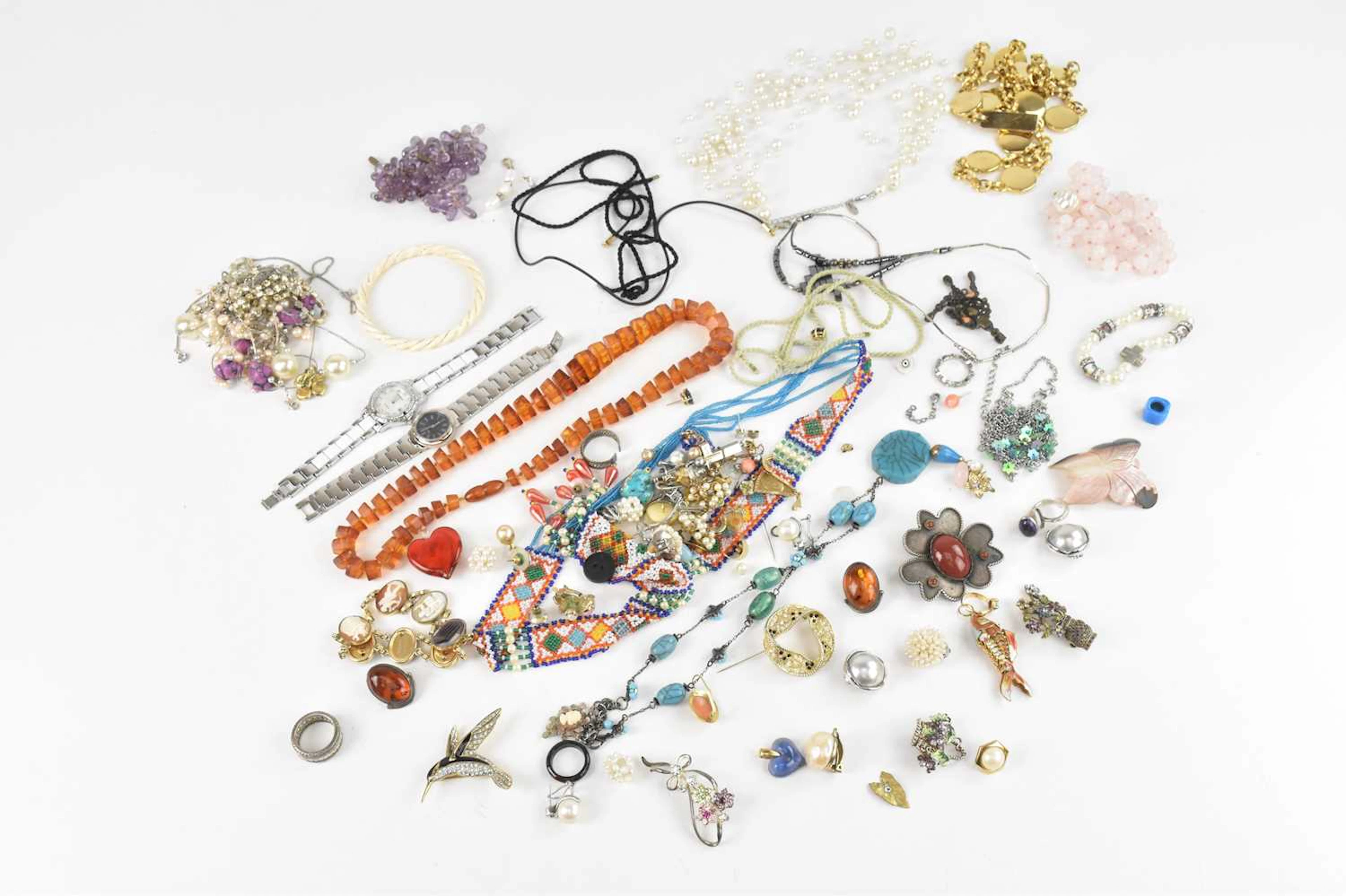 A selection of assorted costume jewellery including a...