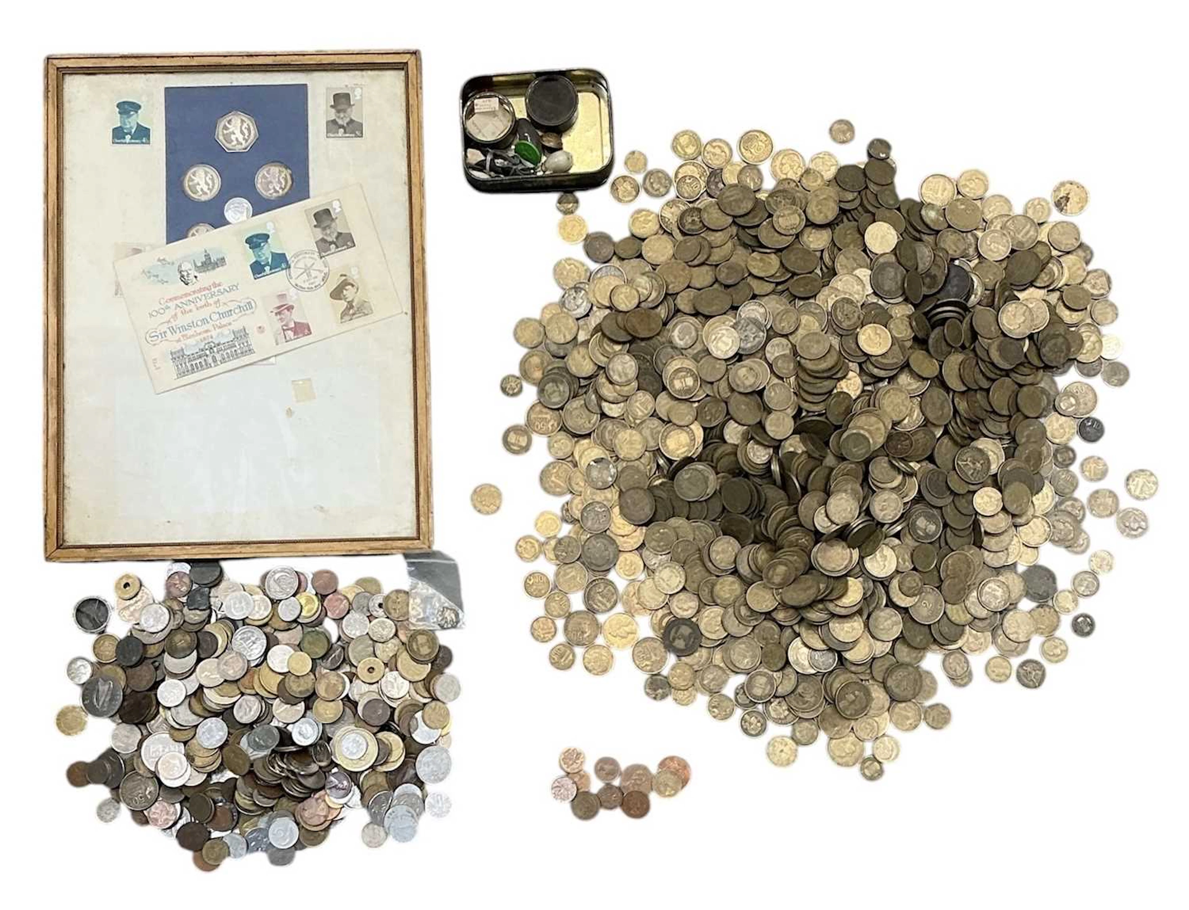 A collection of assorted all world coins and coin packs