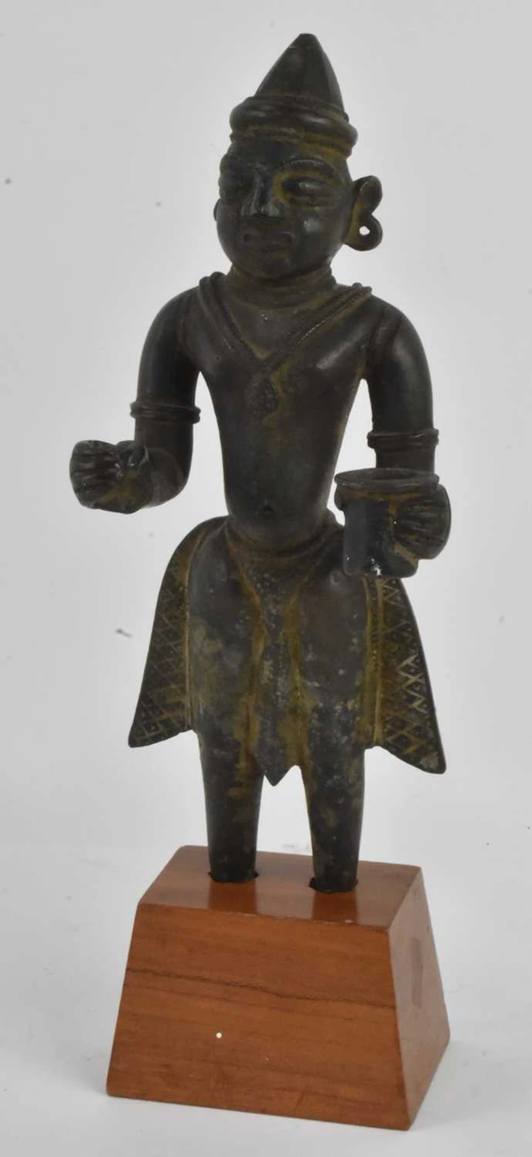 A Southeast Asian bronze standing figure