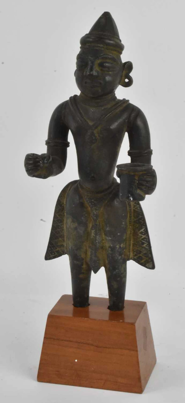 A Southeast Asian bronze standing figure