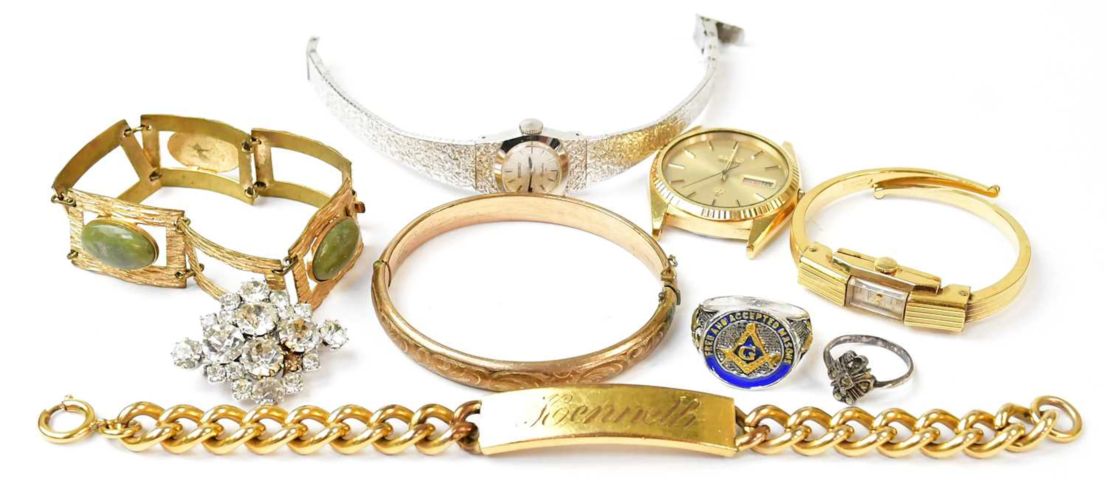 A group of vintage costume jewellery and watches