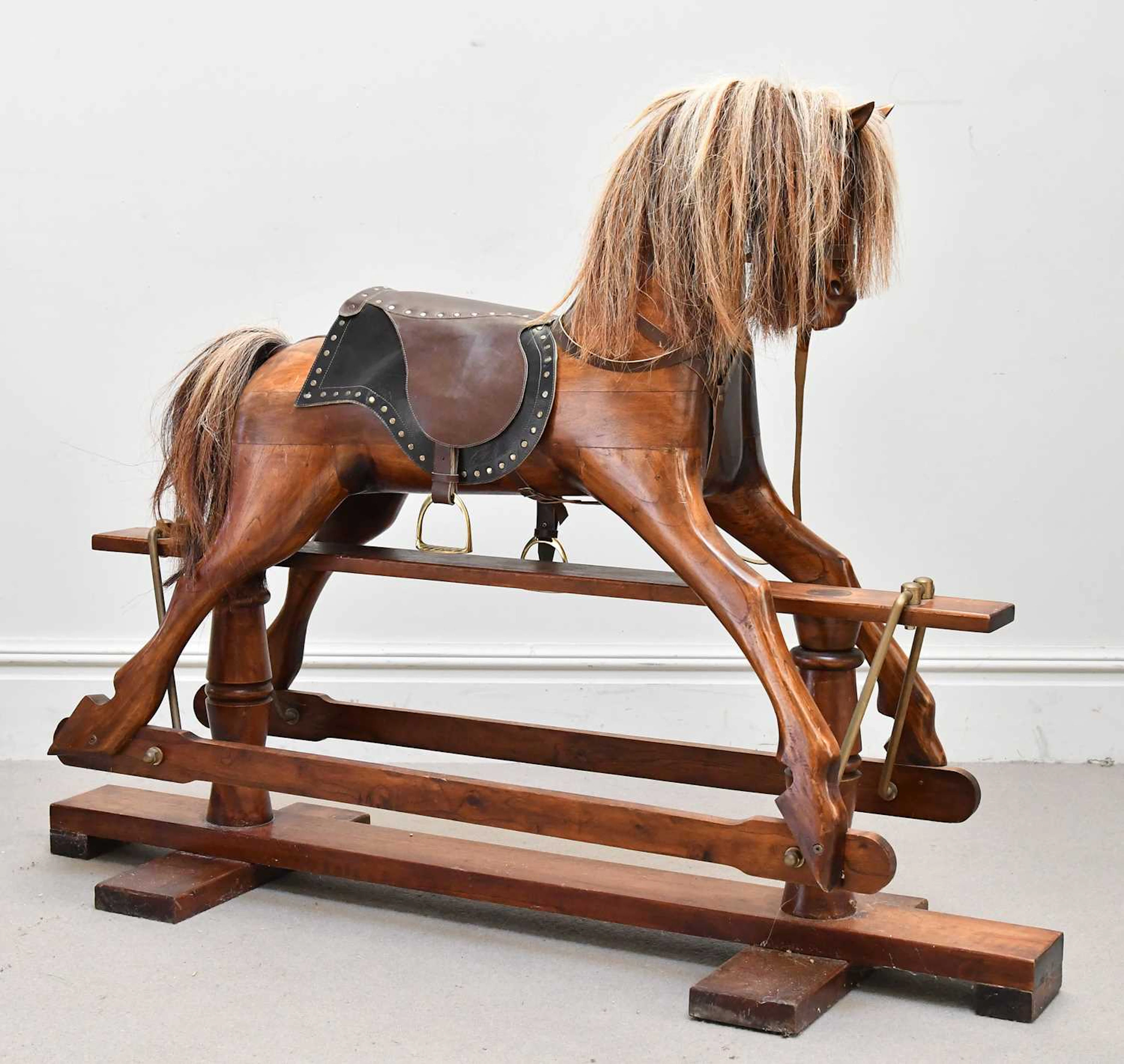 A mahogany rocking horse