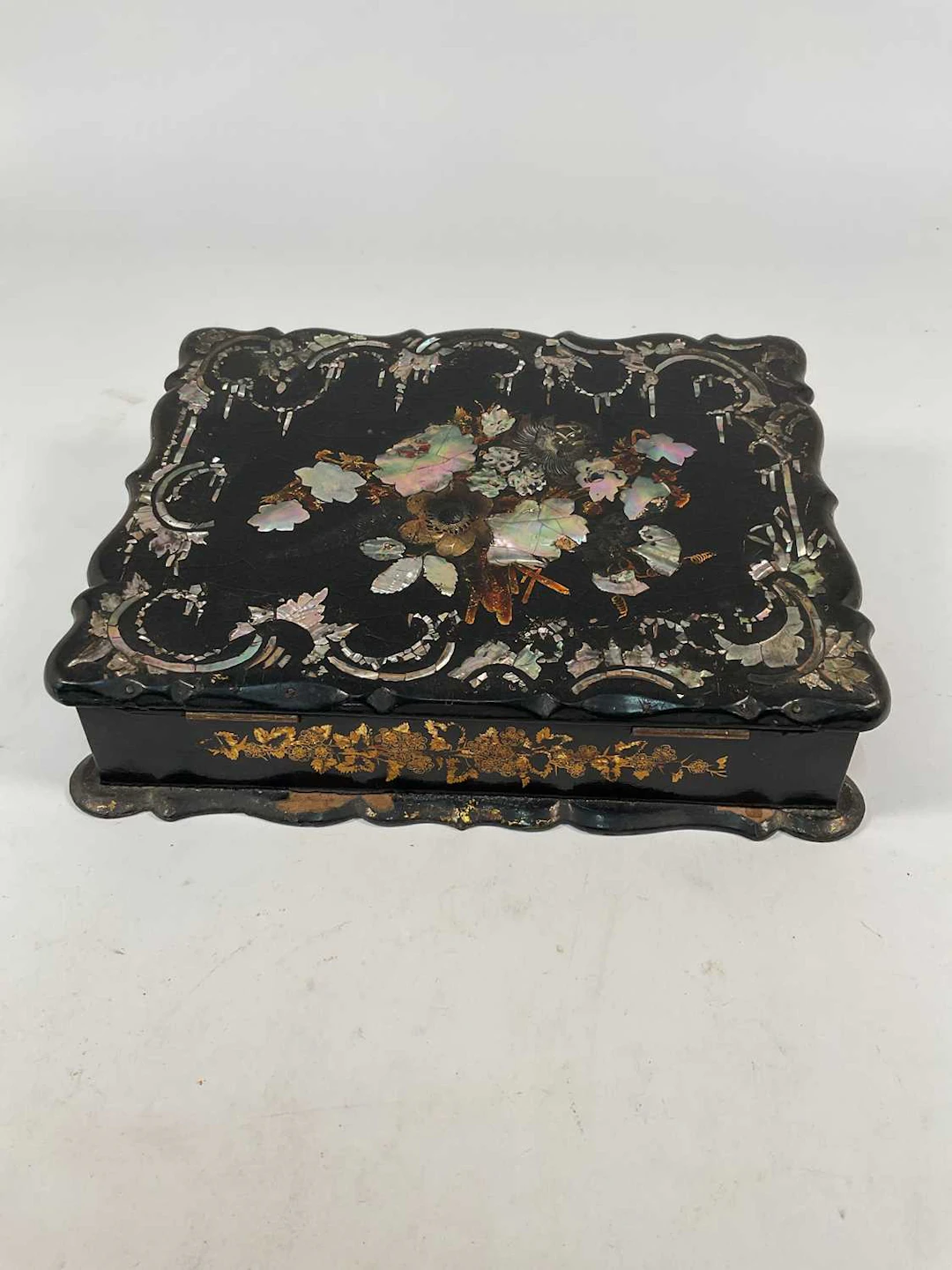 A 19th century lacquered and mother of pearl writing slope