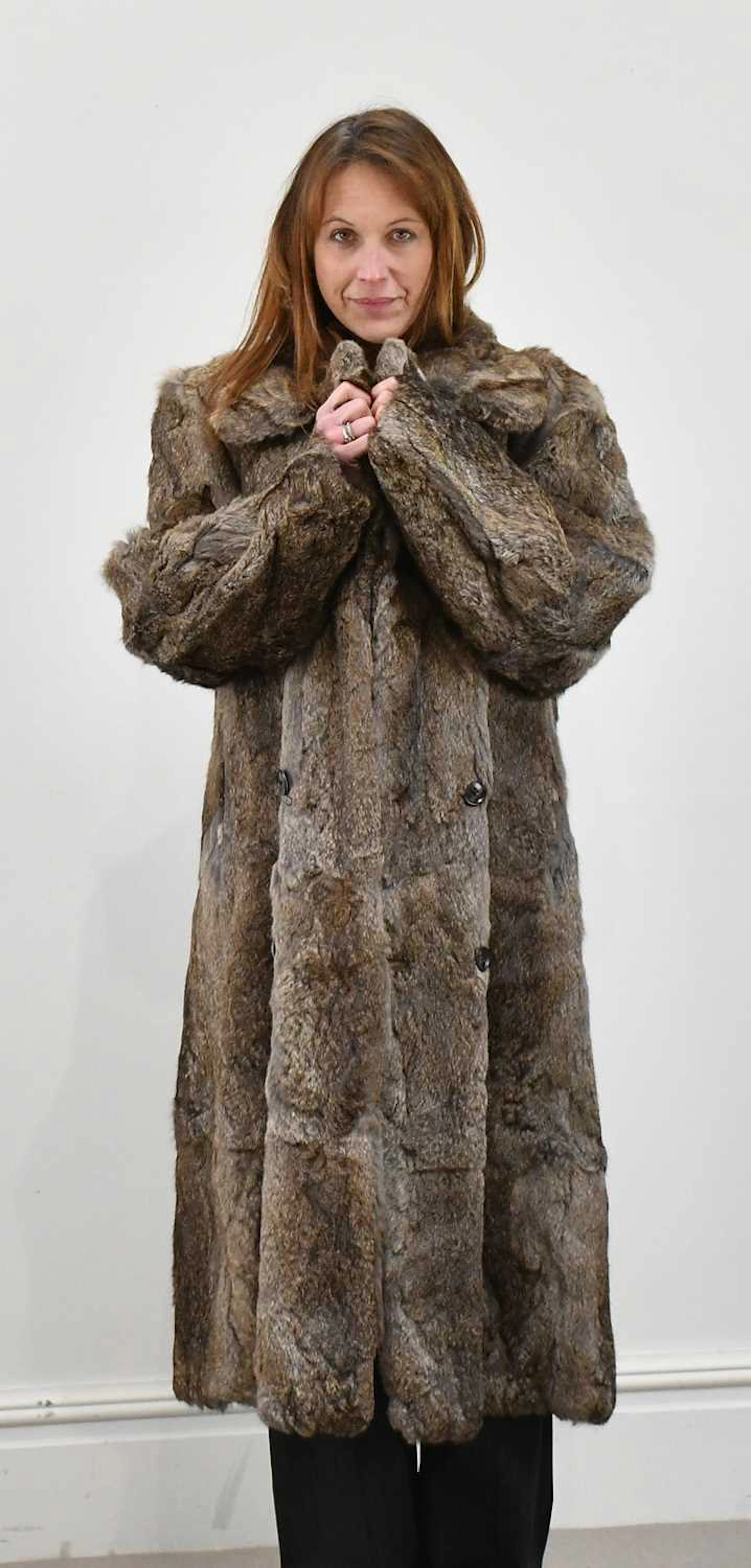 A full-length gentleman's rabbit fur coat