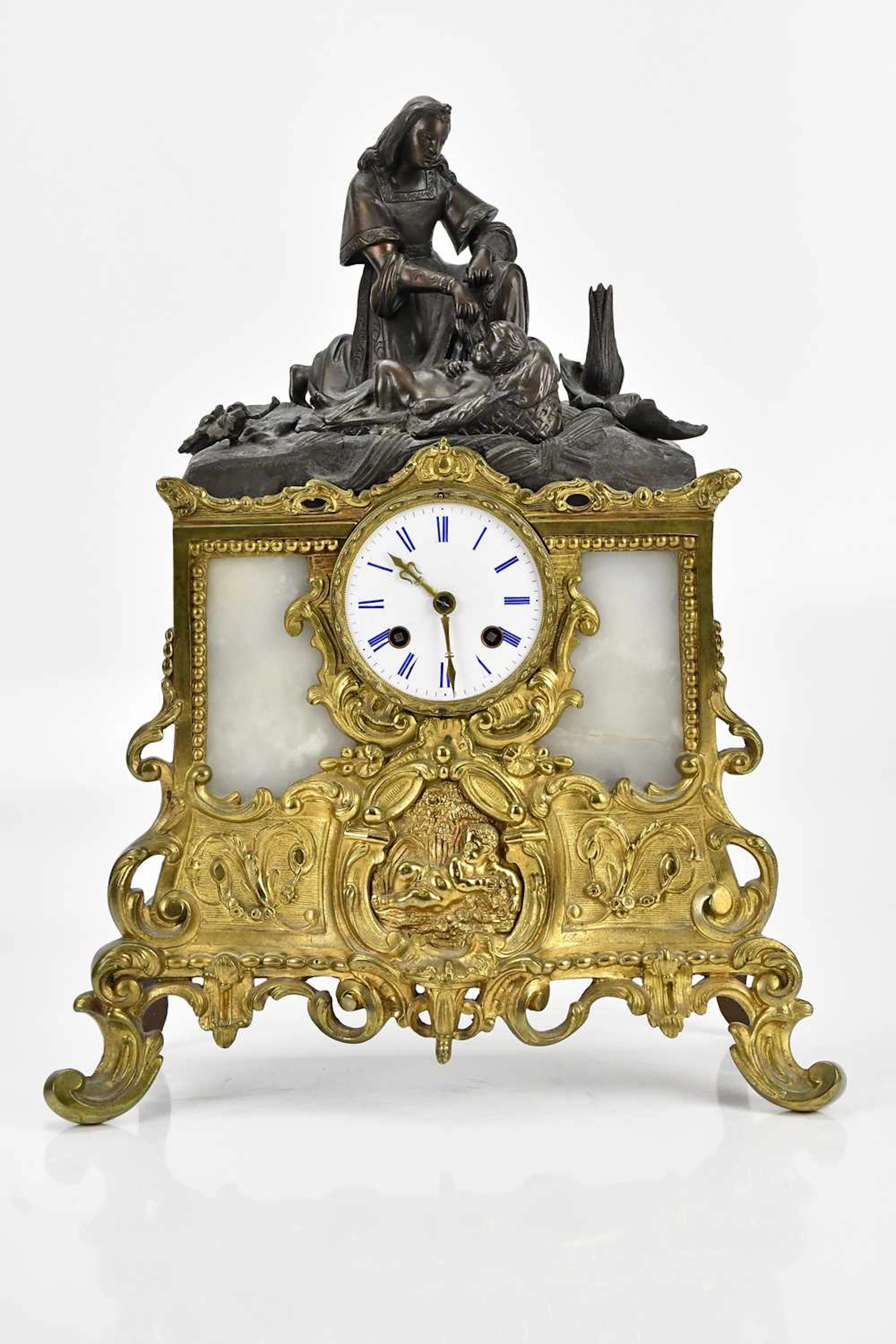 A late 19th century French gilt metal and bronzed spelter...
