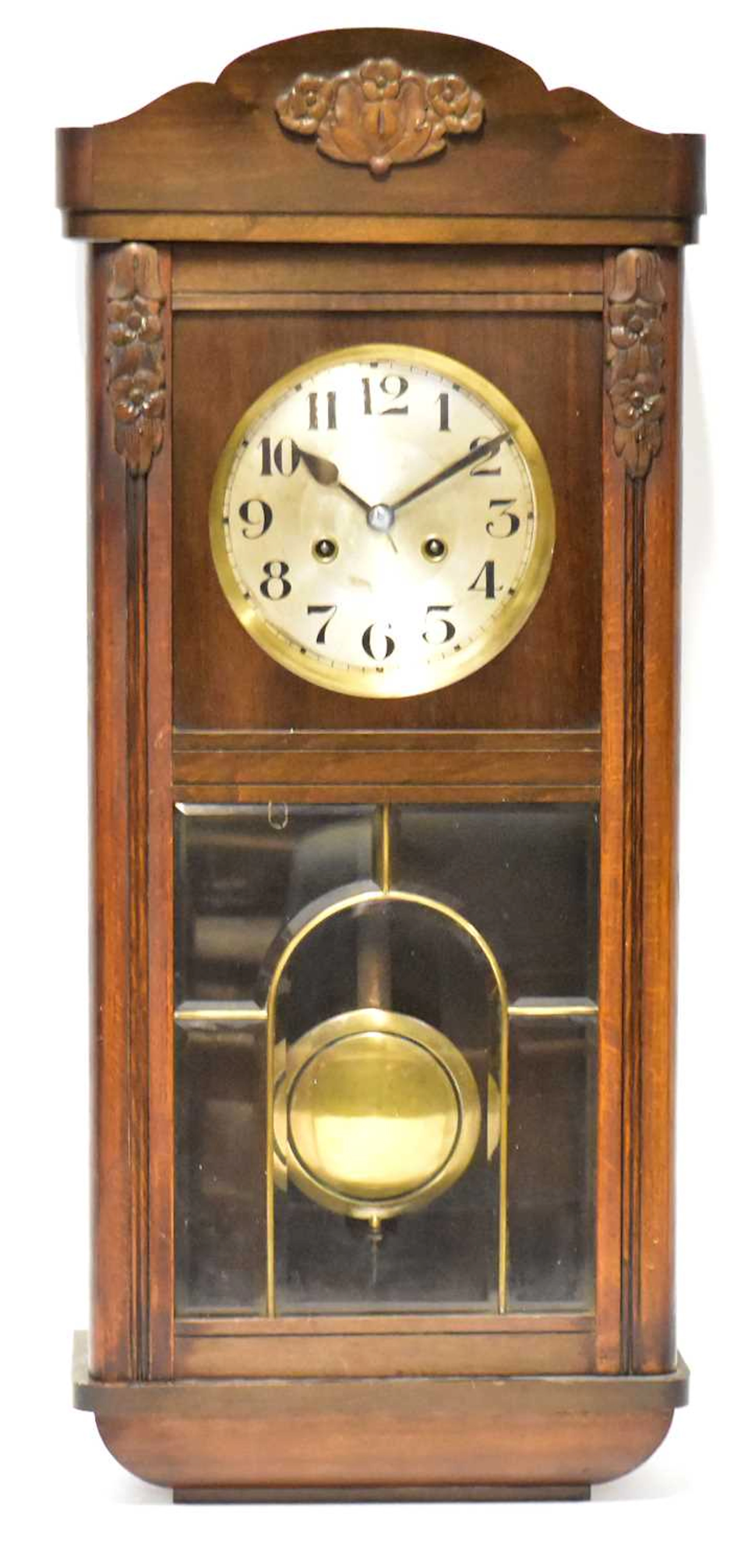 A 1930s German oak and mahogany veneered eight-day wall clock
