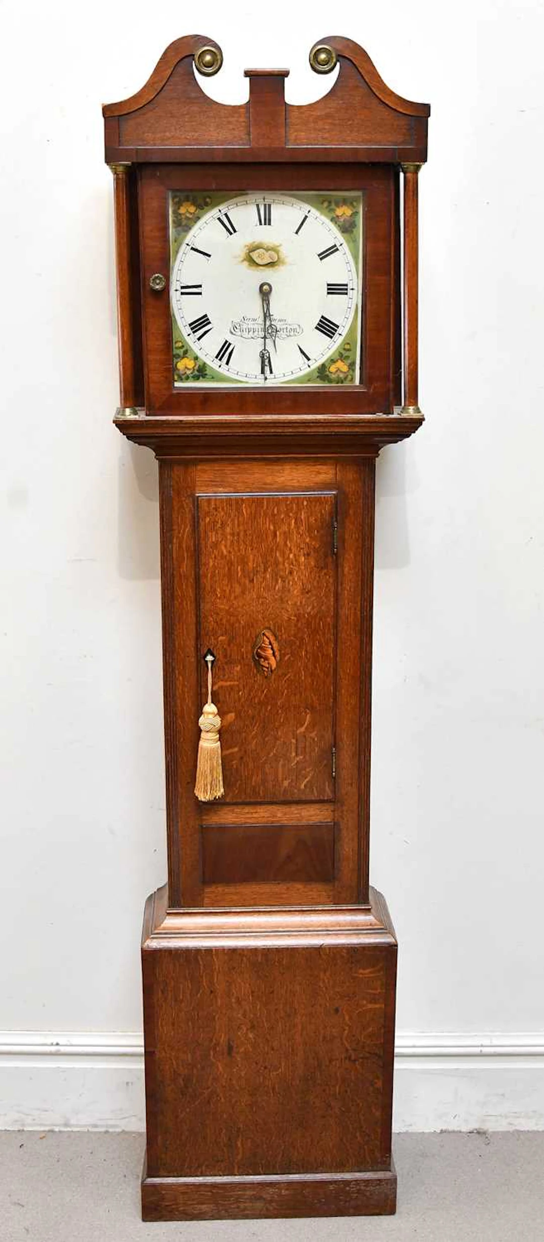 SAM SIMMS CHIPPING NORTON; a George III oak longcase clock