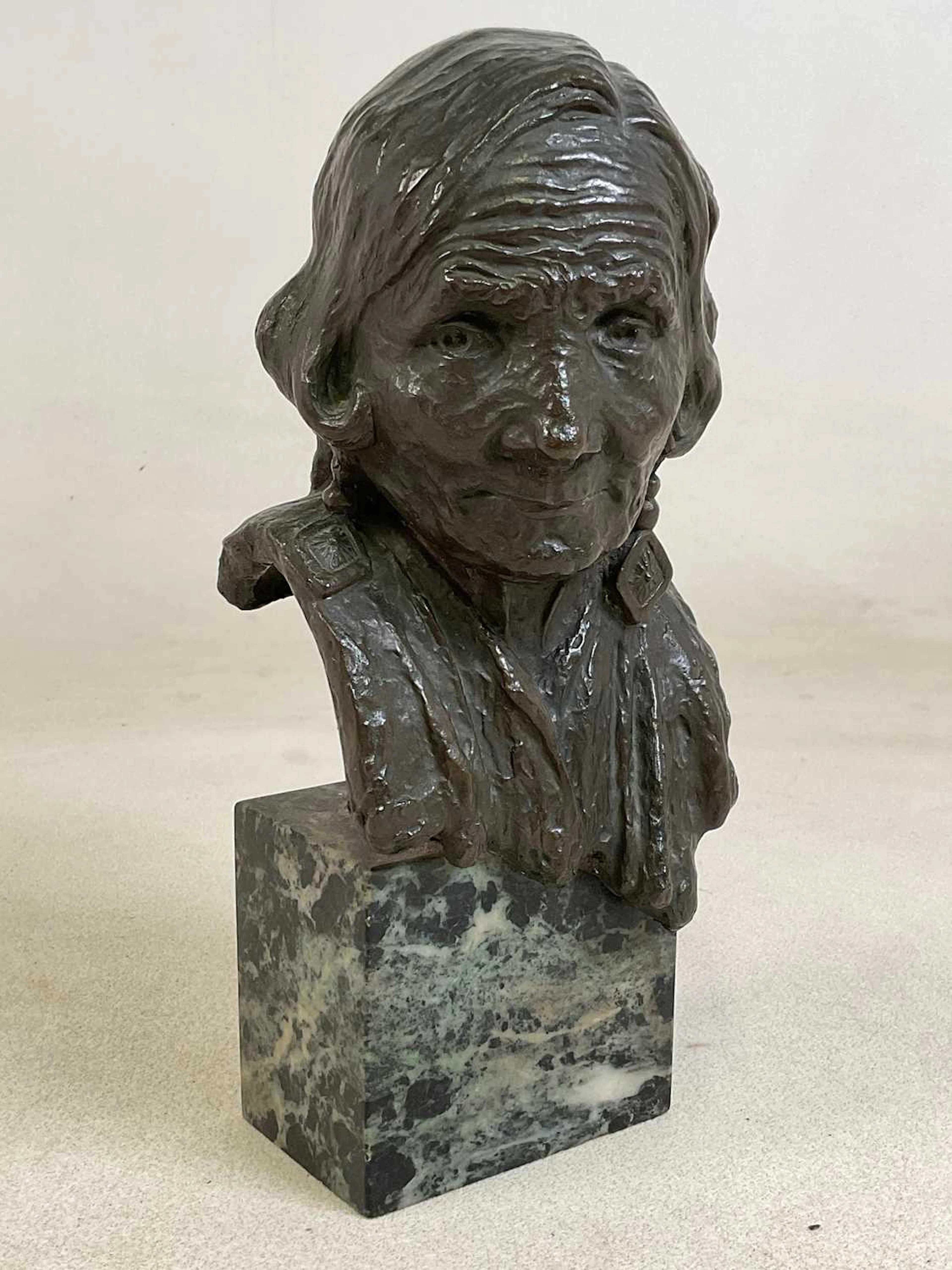 ALFREDA BERESFORD; a bronze portrait bust of a Native American elder