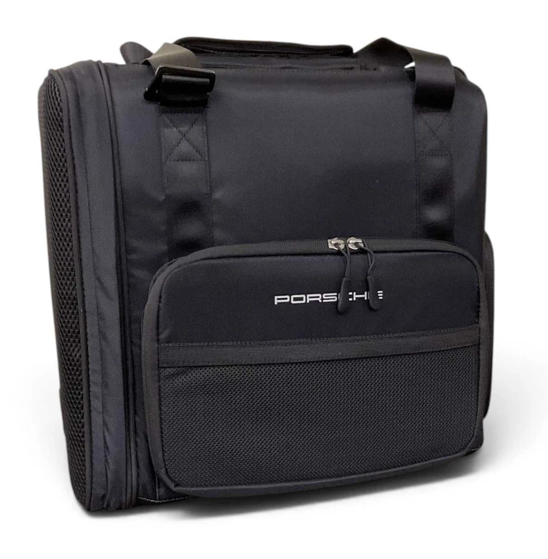 PORSCHE; a black canvas cooler bag