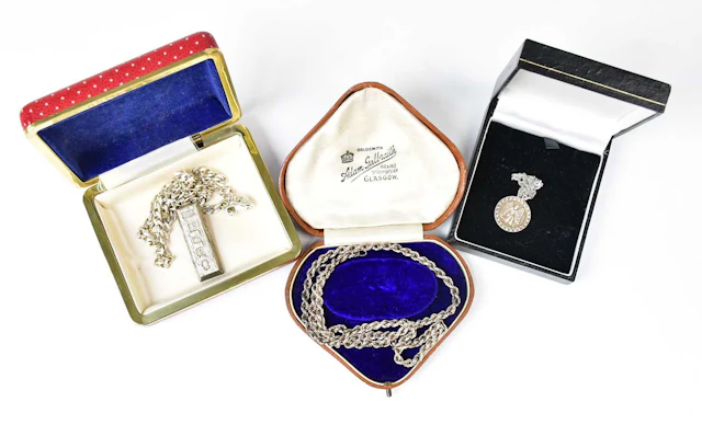 A group of silver jewellery comprising a hallmarked...