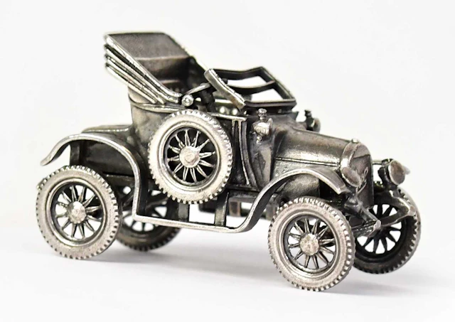 UNO A ERRE; an Italian hallmarked silver miniature model of a vintage Opel car