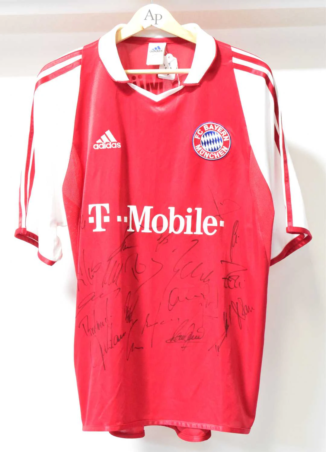 BAYERN MUNICH FC; a team football shirt signed by the squad