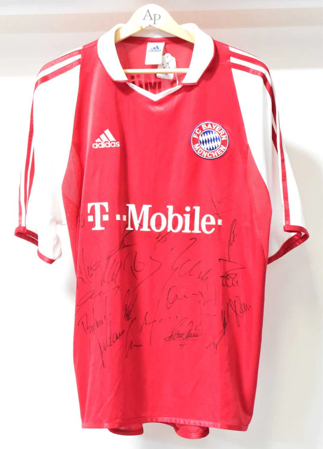 BAYERN MUNICH FC; a team football shirt signed by the squad