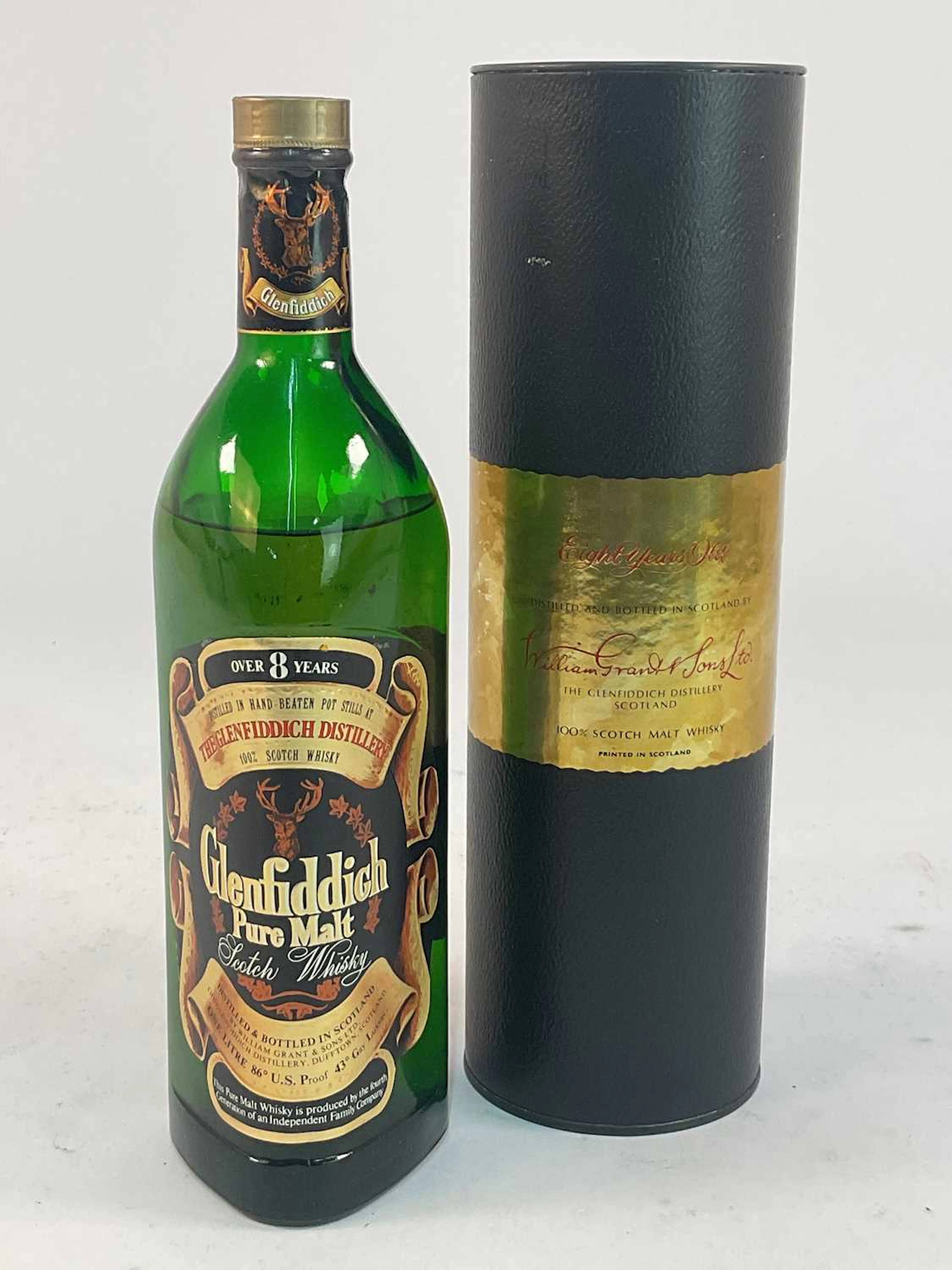WHISKY; a bottle of Glenfiddich 8 year old pure malt Scotch whisky