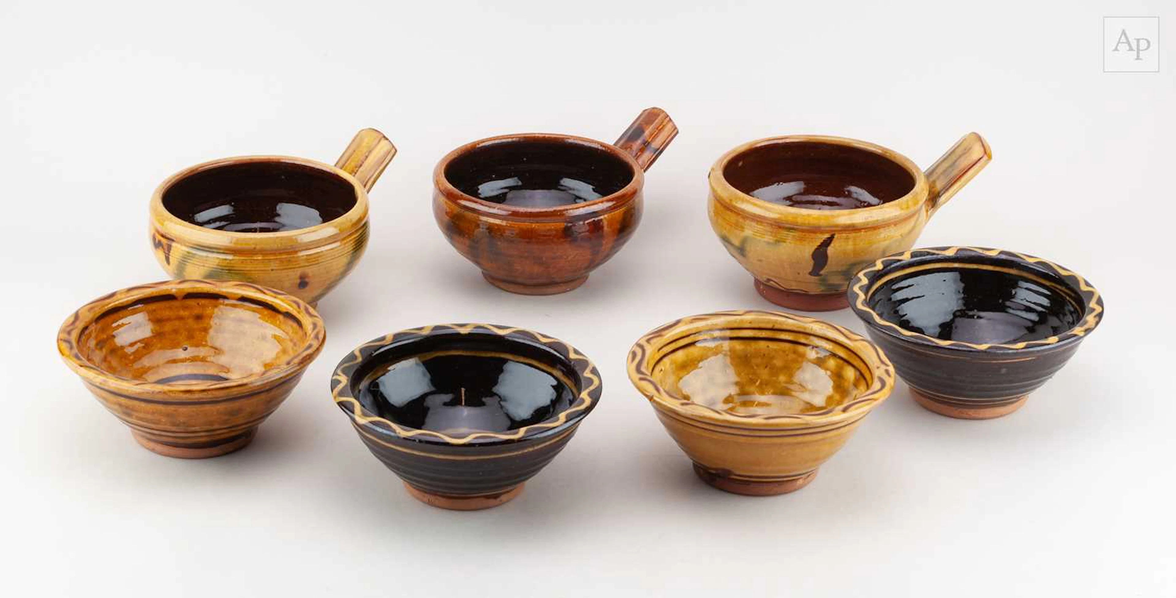 CLIVE BOWEN (born 1943); a quartet of slipware bowls with...