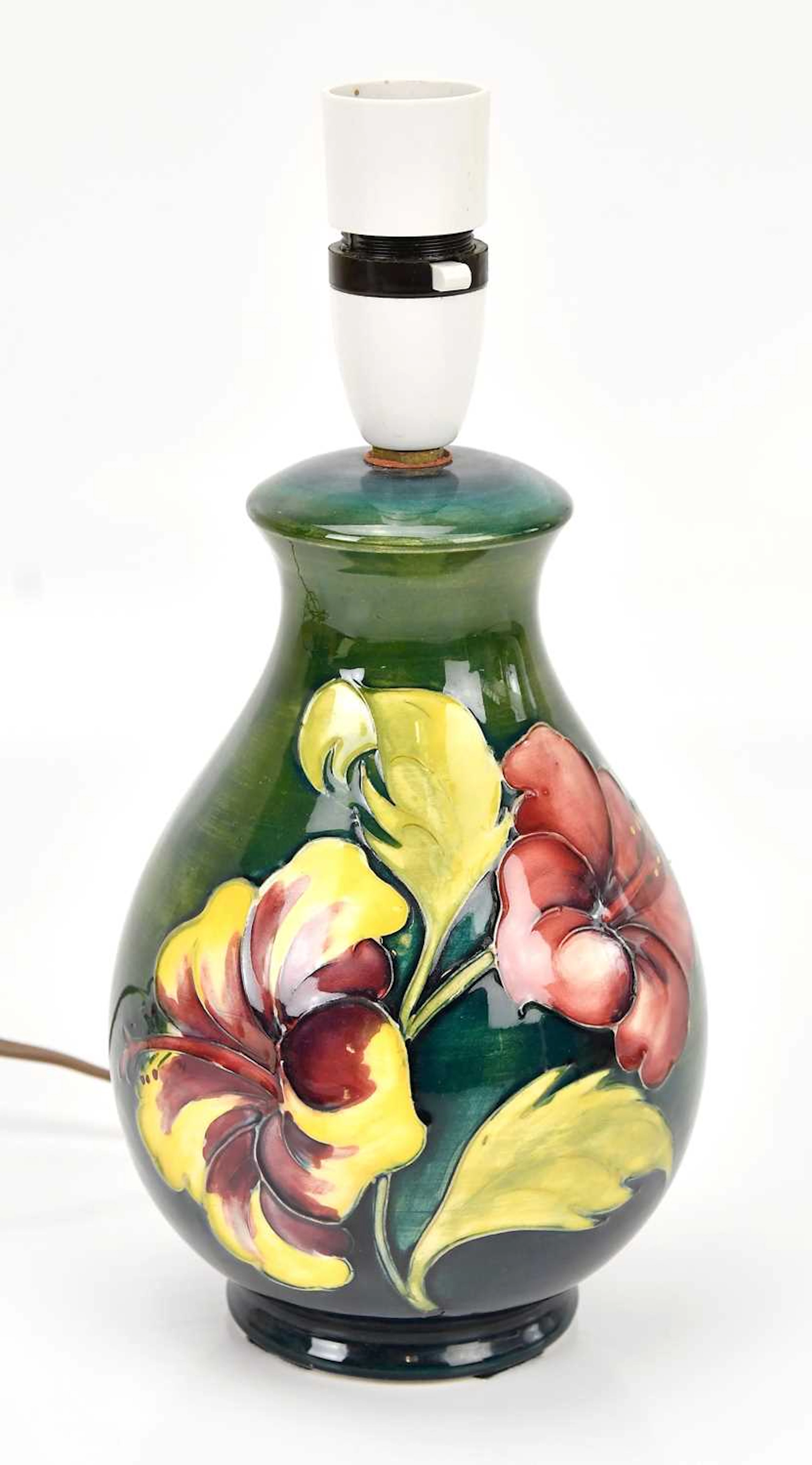 MOORCROFT; a 'Hibiscus' pattern table lamp