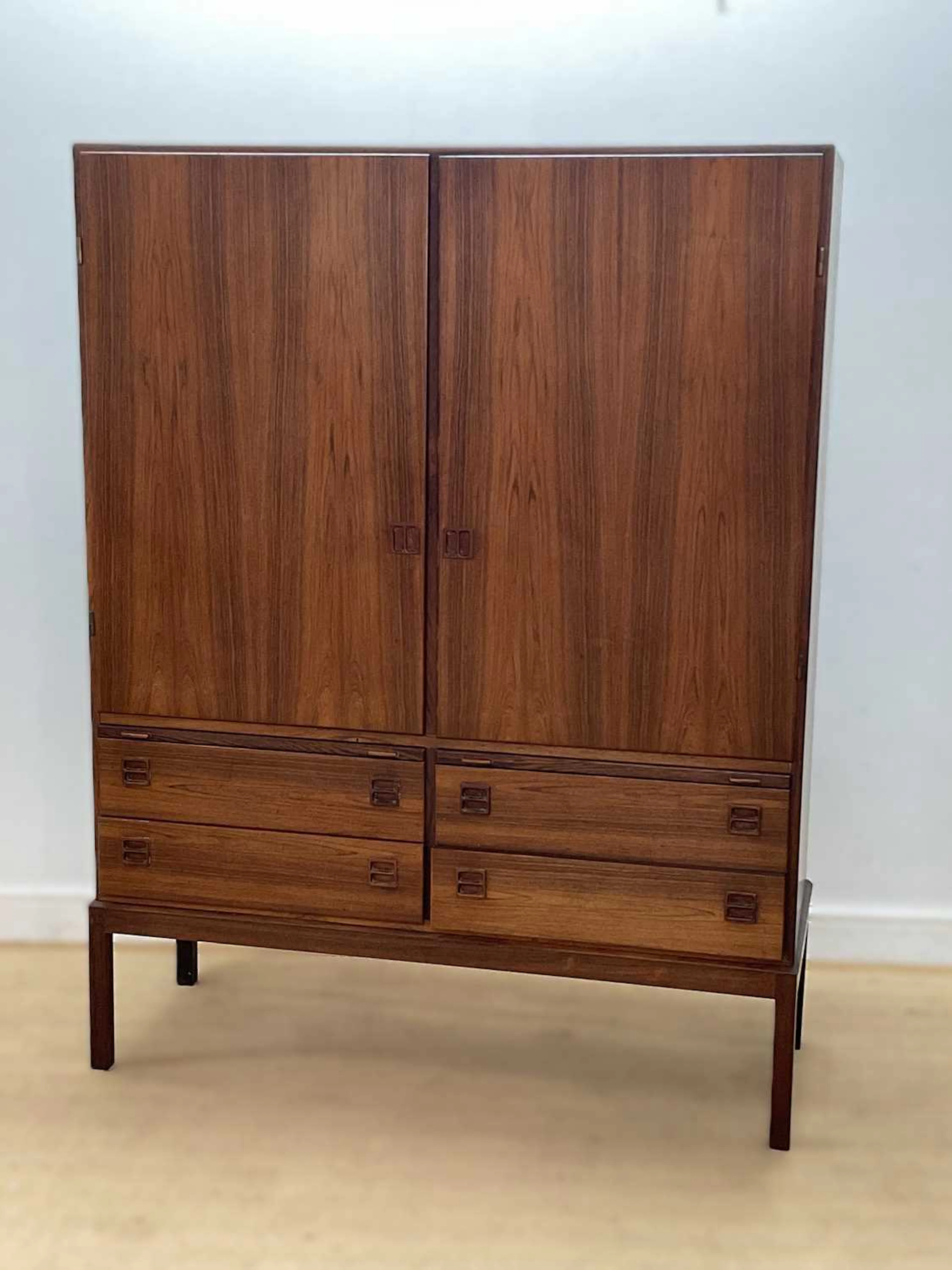 A mid 20th century Danish Indian rosewood cabinet with...