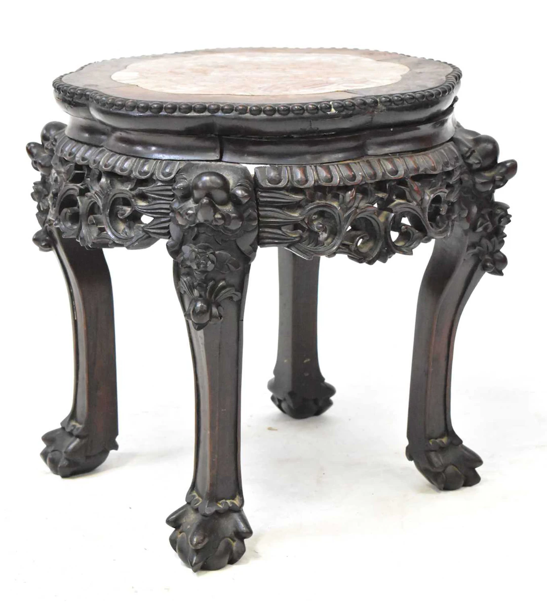 A Chinese rosewood marble topped jardinière stand