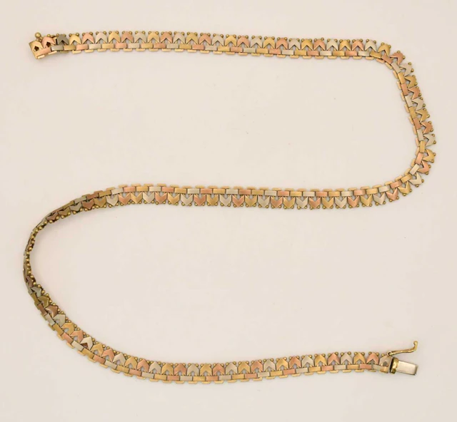 A 9ct three colour gold square/chevron tight link necklace