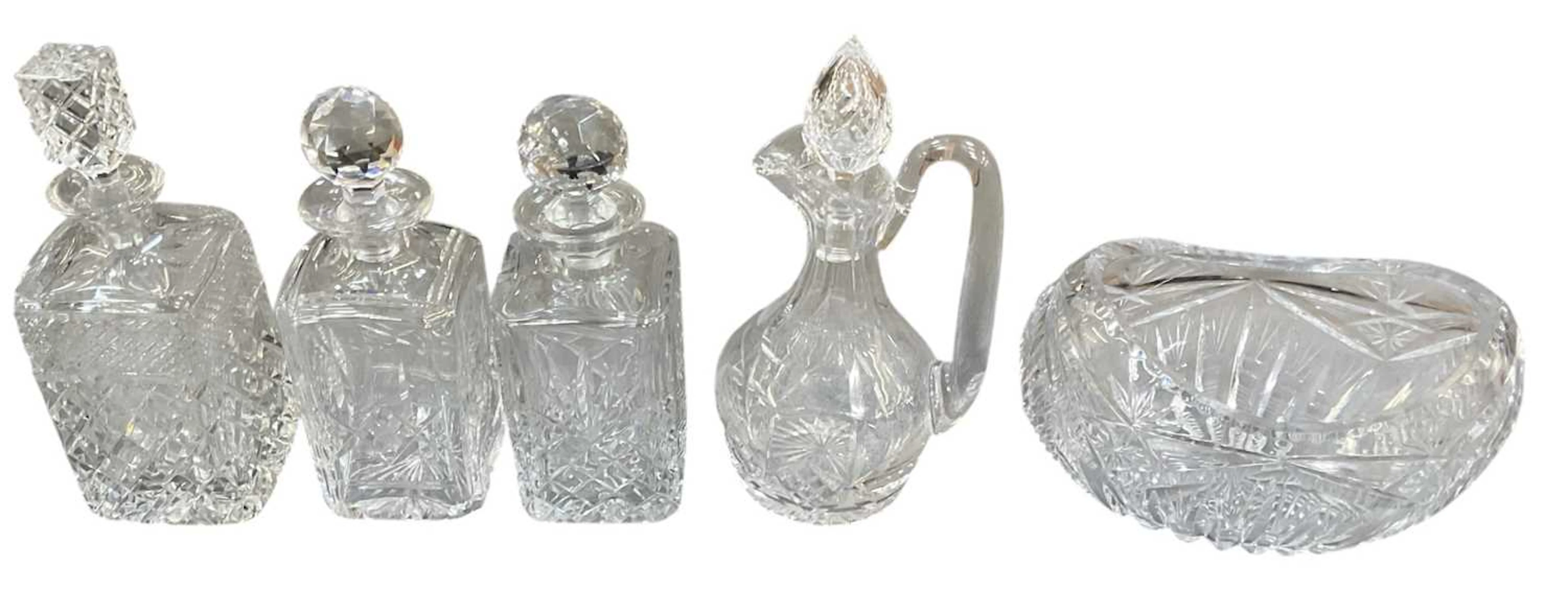 Four cut glass decanters
