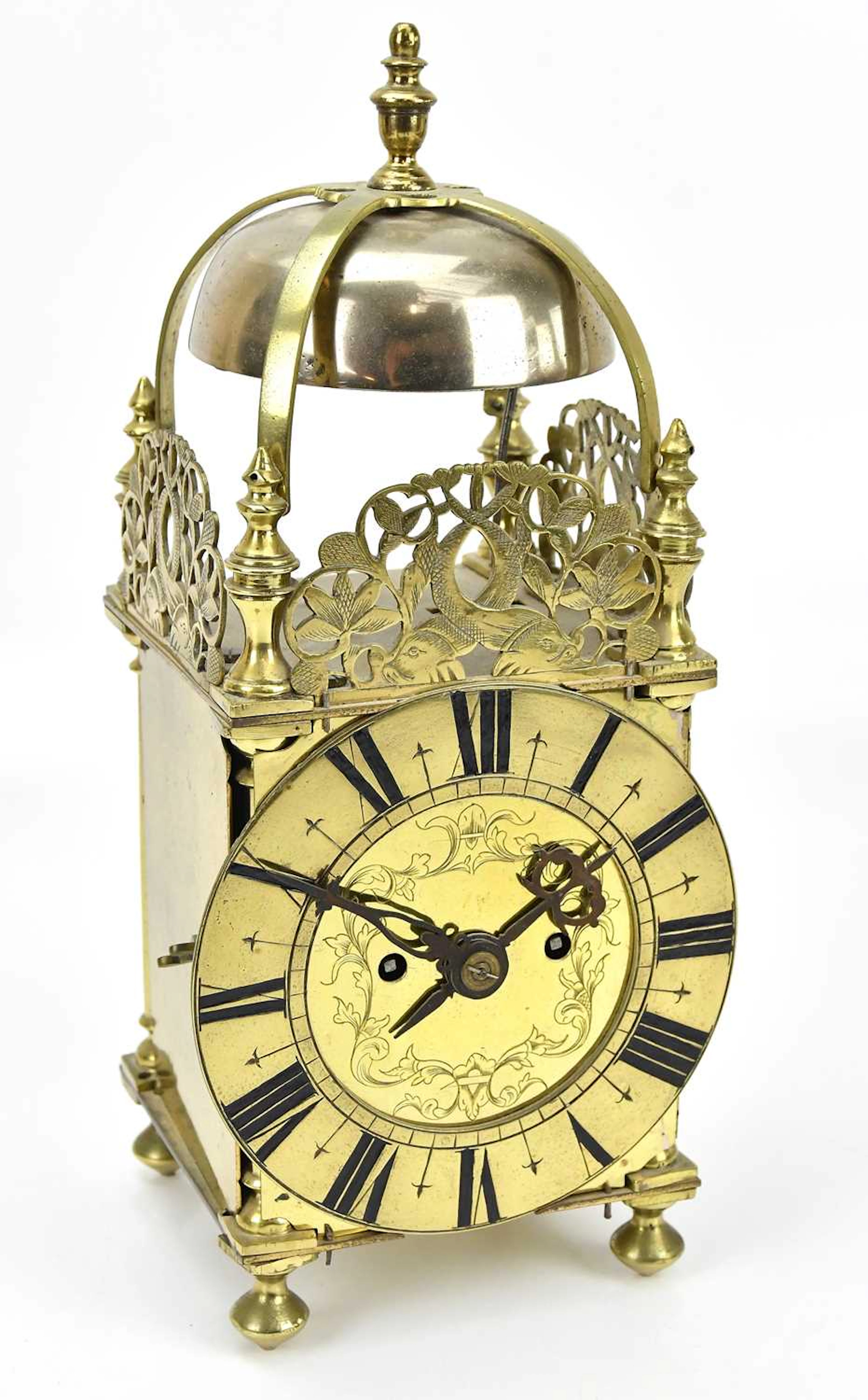 A reproduction brass lantern clock