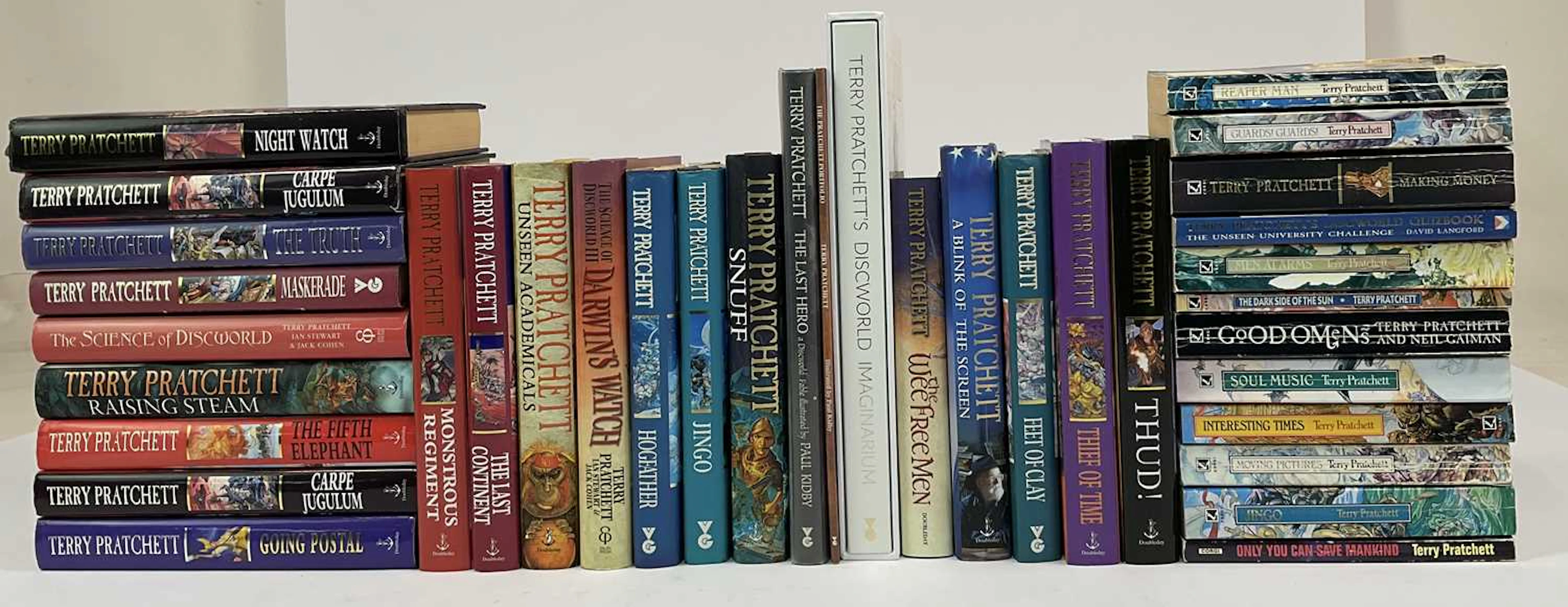 TERRY PRATCHETT; a collection of thirty-six hardback and softback books