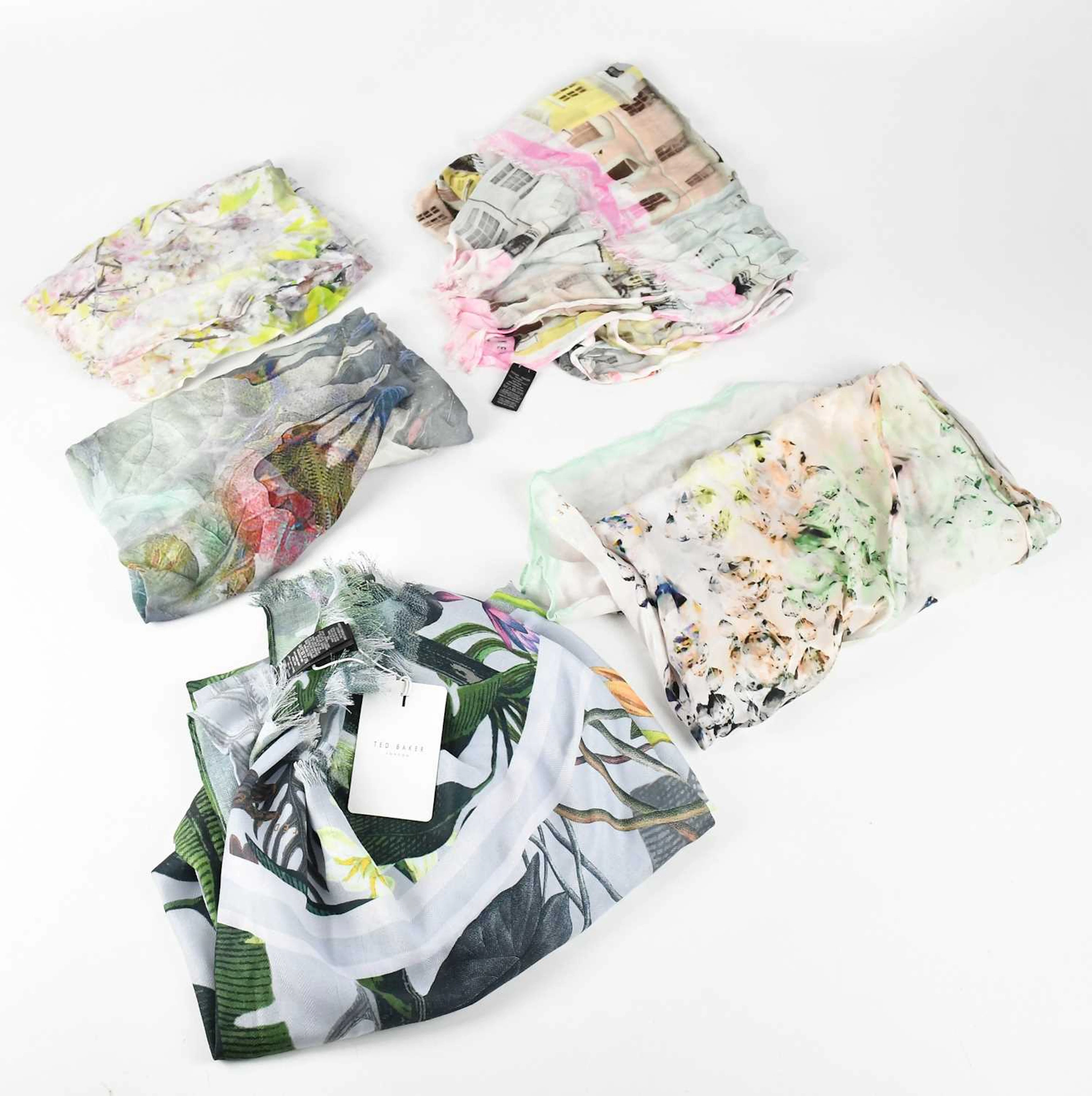 TED BAKER; five scarves comprising a 100% silk scarf...