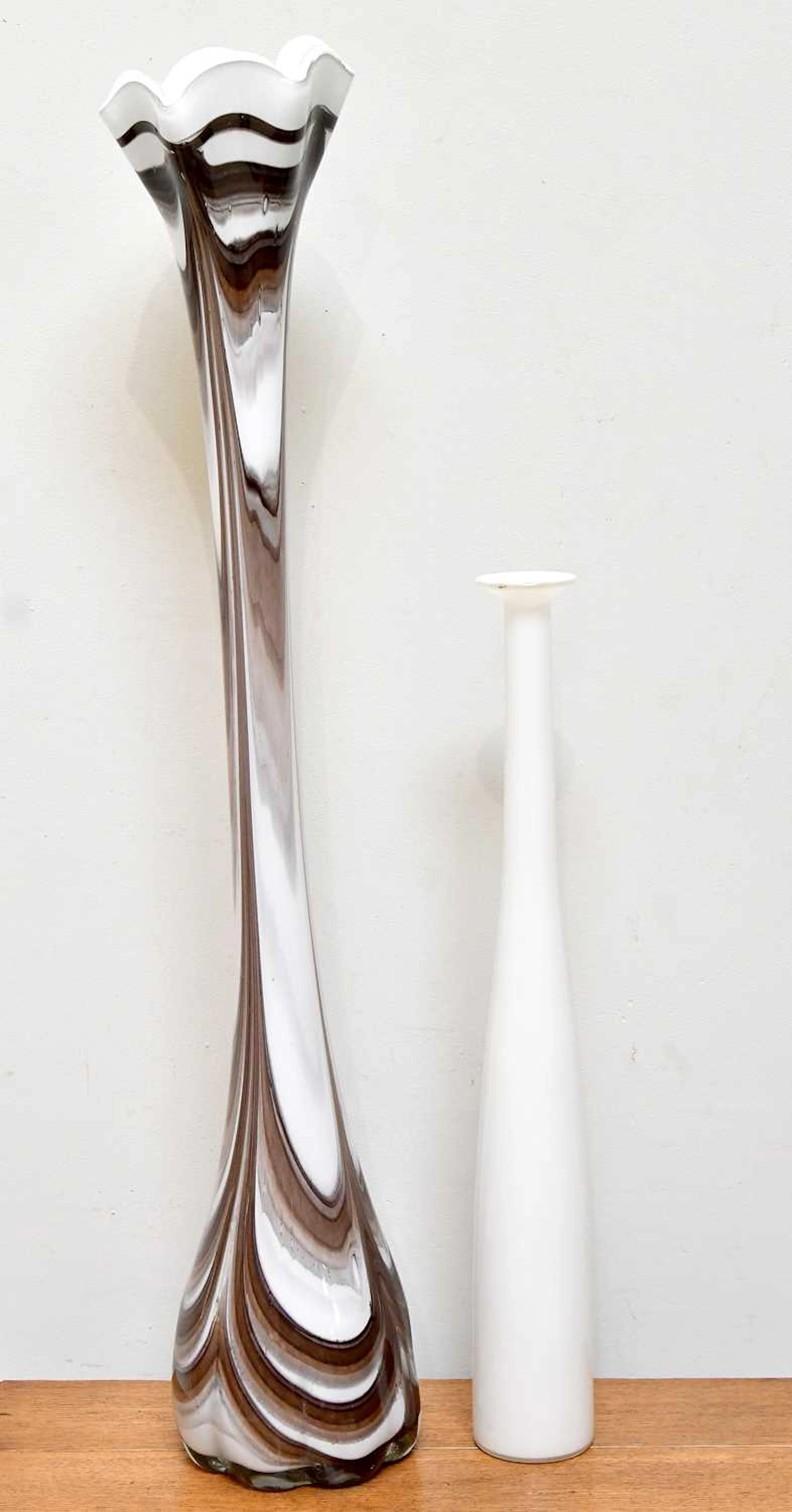 A very tall Murano type marbled white and brown glass vase