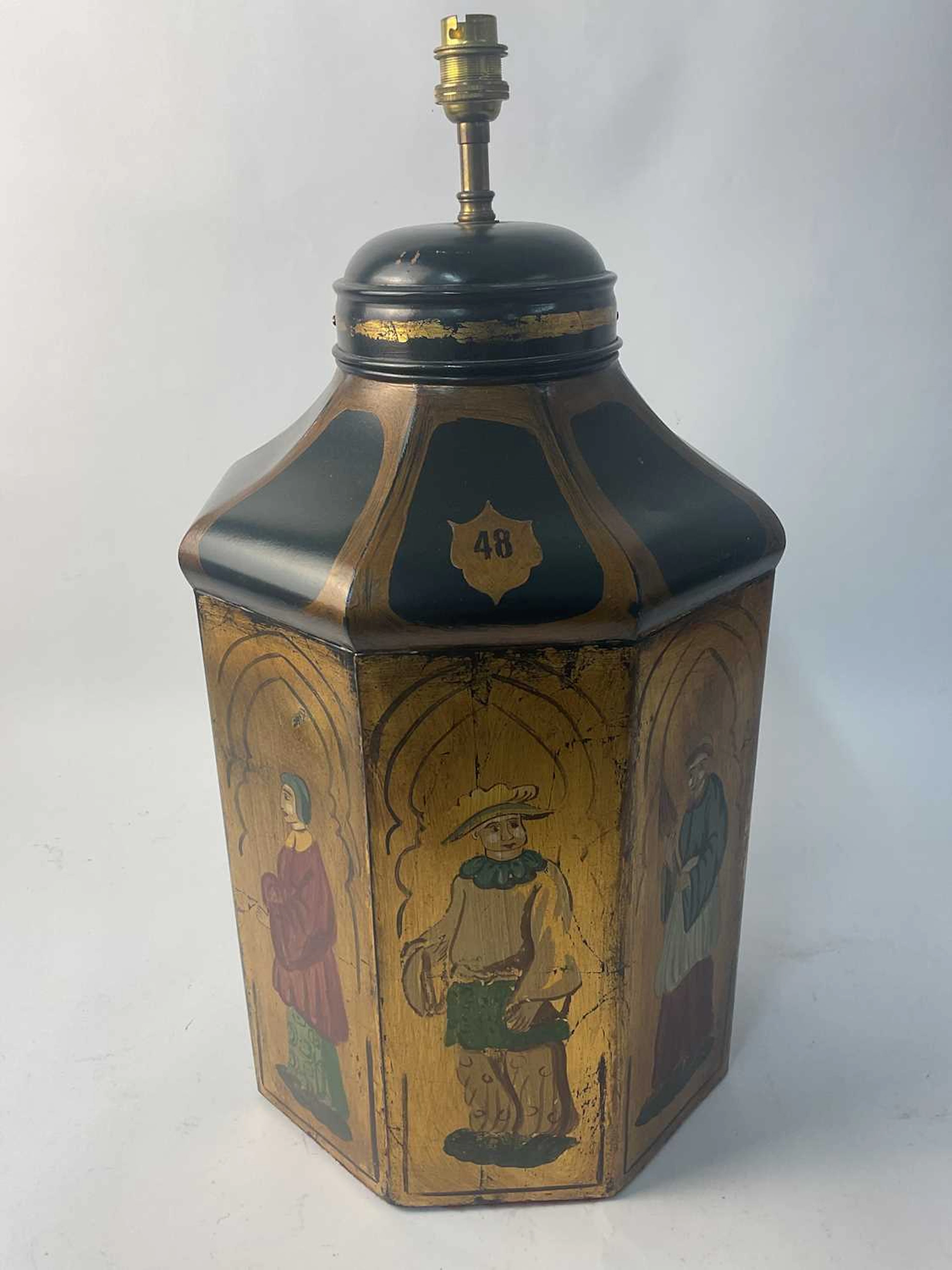 A reproduction octagonal tea caddy having three hand...