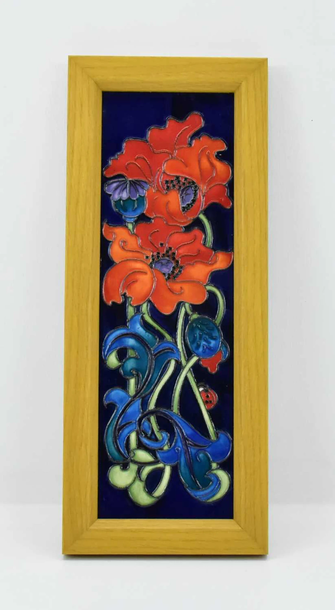 MOORCROFT; an Art Nouveau 'Poppy' pattern tube-lined...