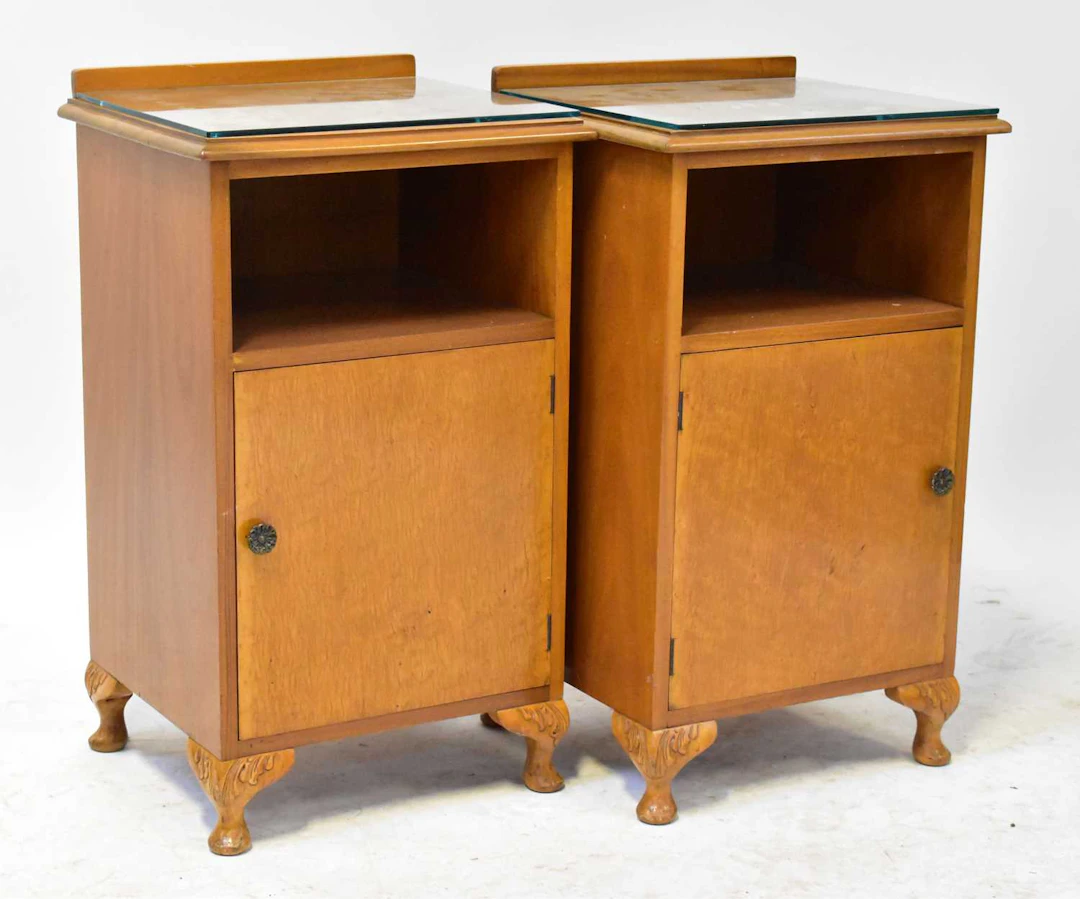 A pair of 1950s maple bedside tables