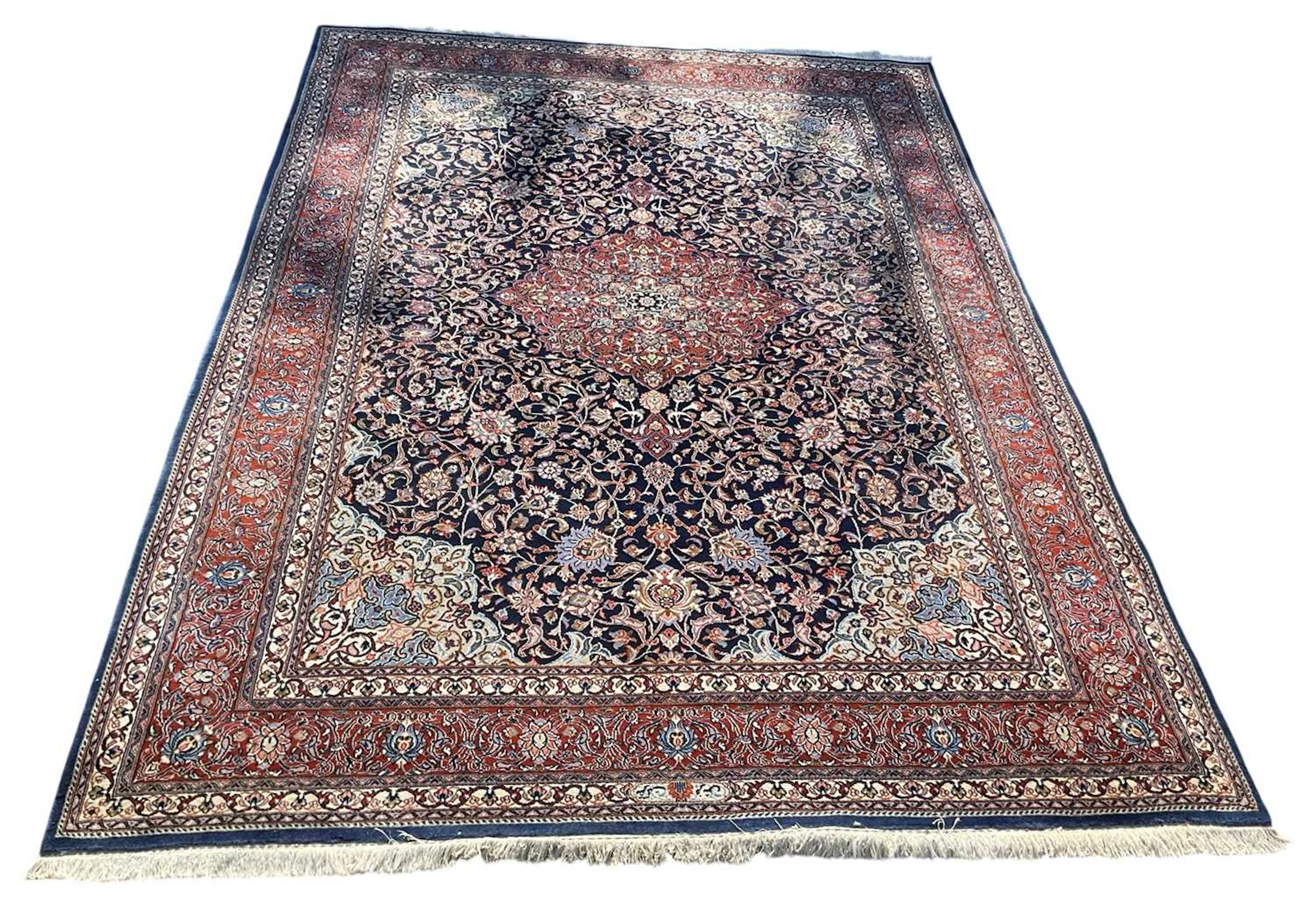 A good modern hand woven Persian style floral carpet