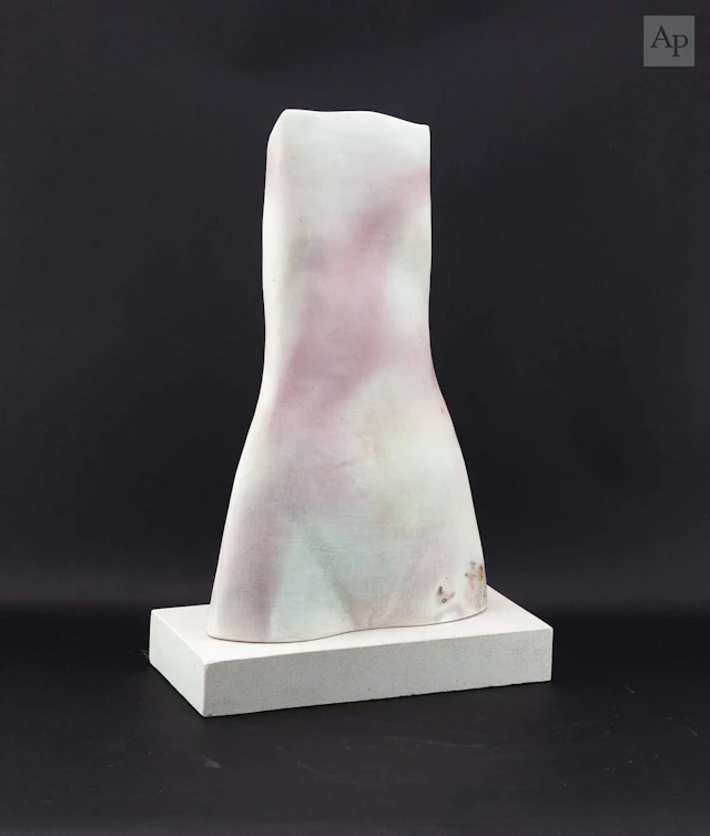JUDITH DAVIES (born 1955); a large flattened earthenware...